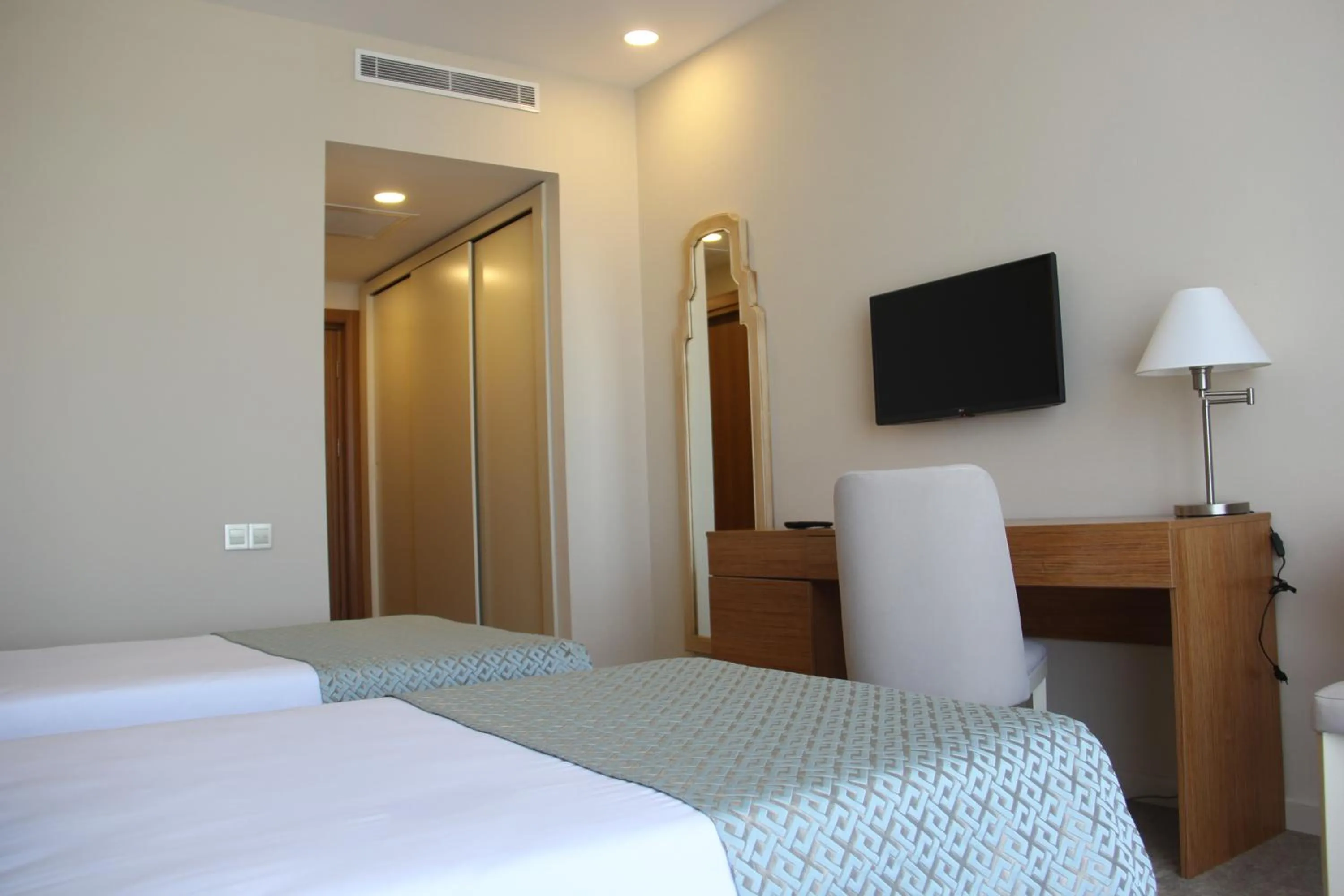 Bed in Khazar Inji Hotel