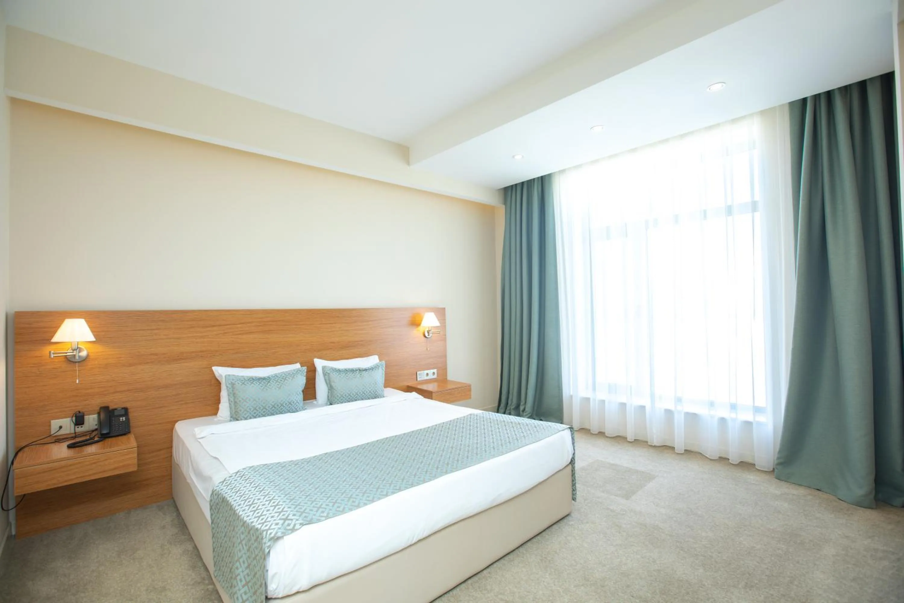 Bed in Khazar Inji Hotel