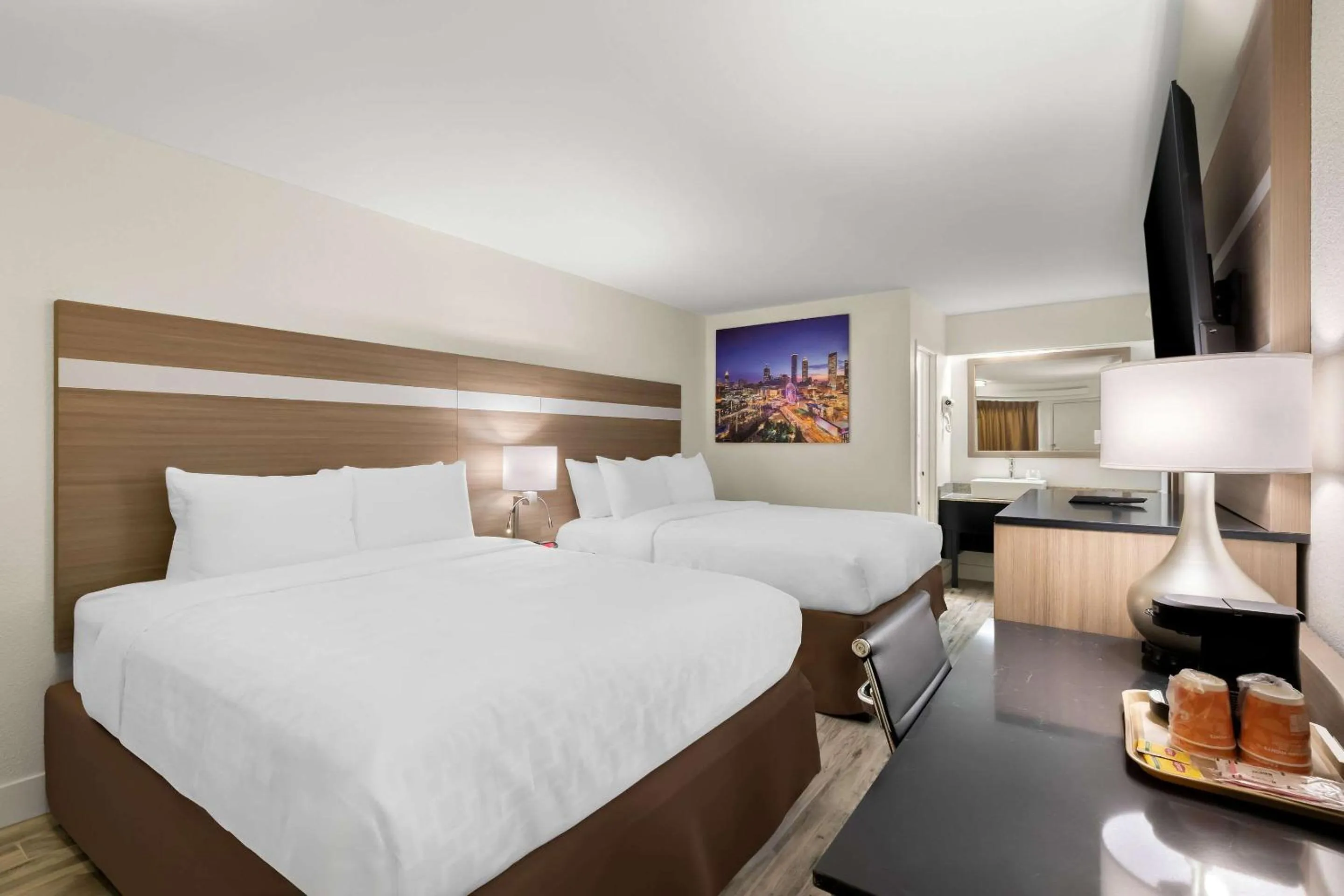 Bedroom, Bed in Clarion Pointe Kennesaw Town Center