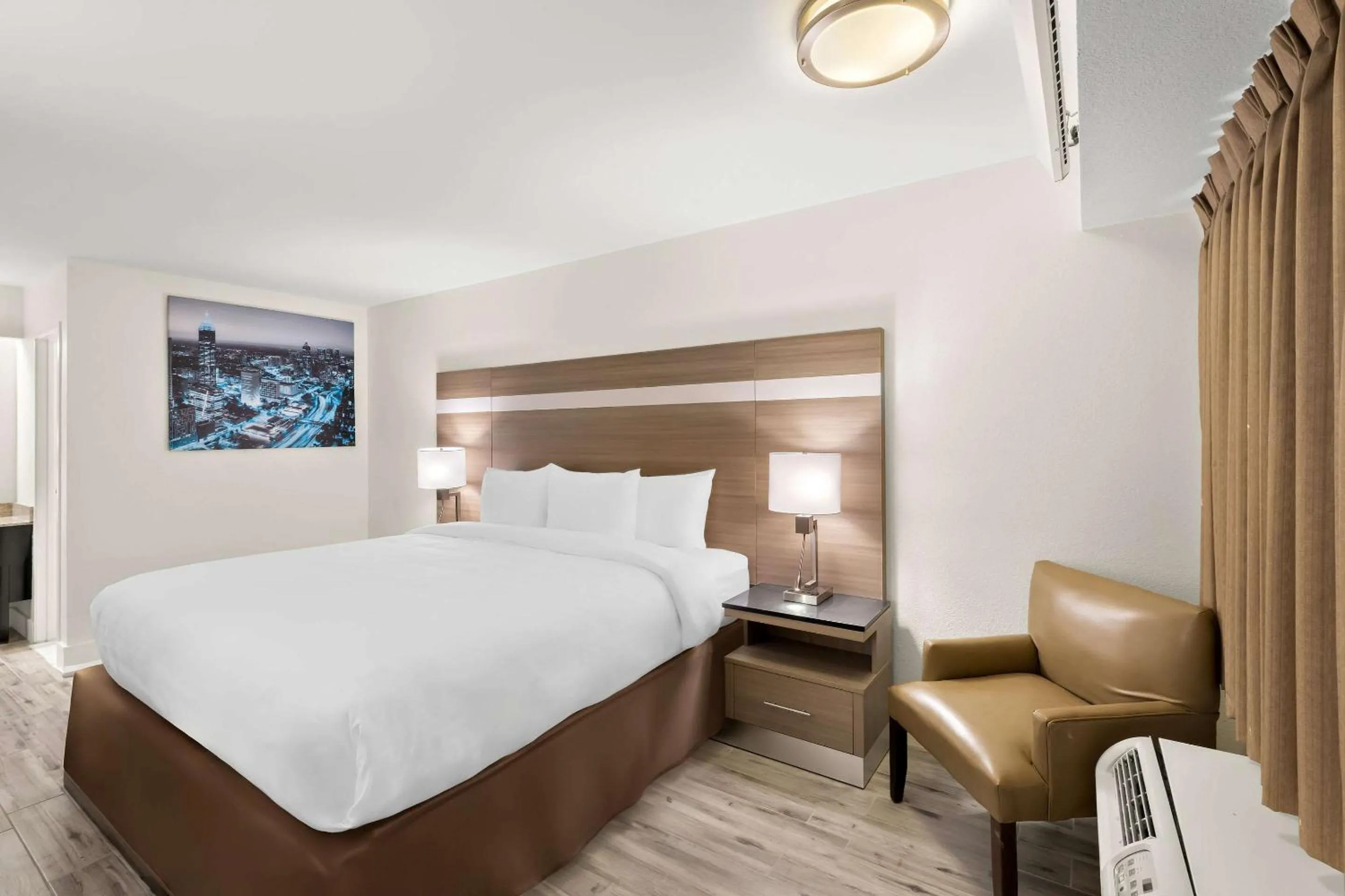 Bedroom, Bed in Clarion Pointe Kennesaw Town Center