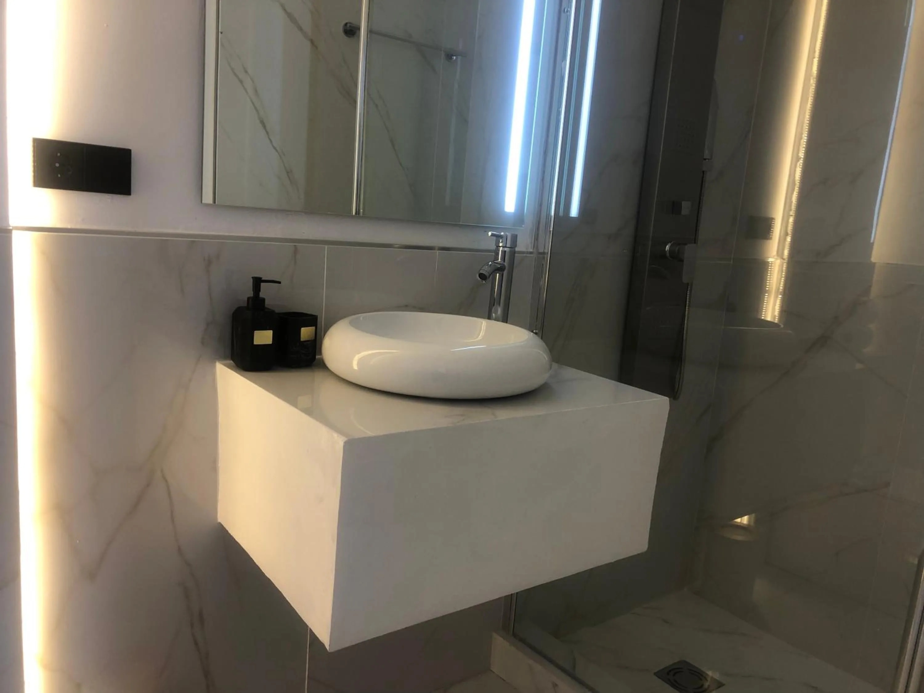 Bathroom in OM Hotels