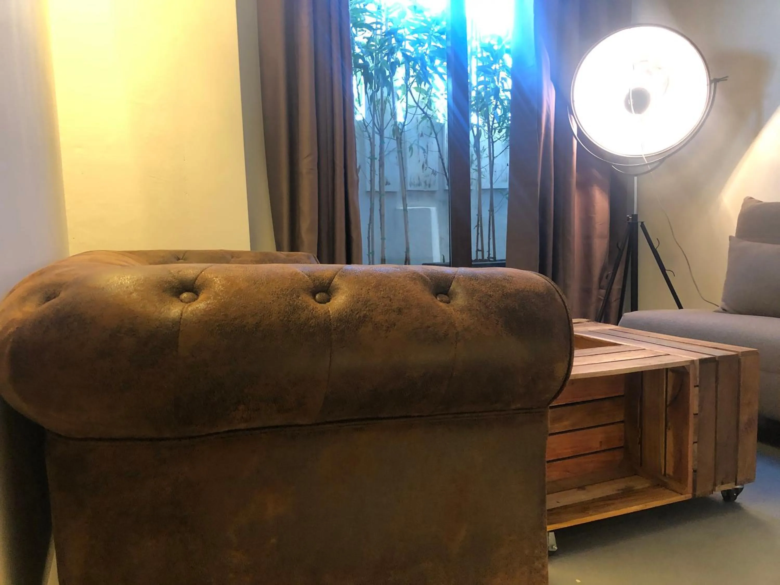 Living room, Bed in OM Hotels