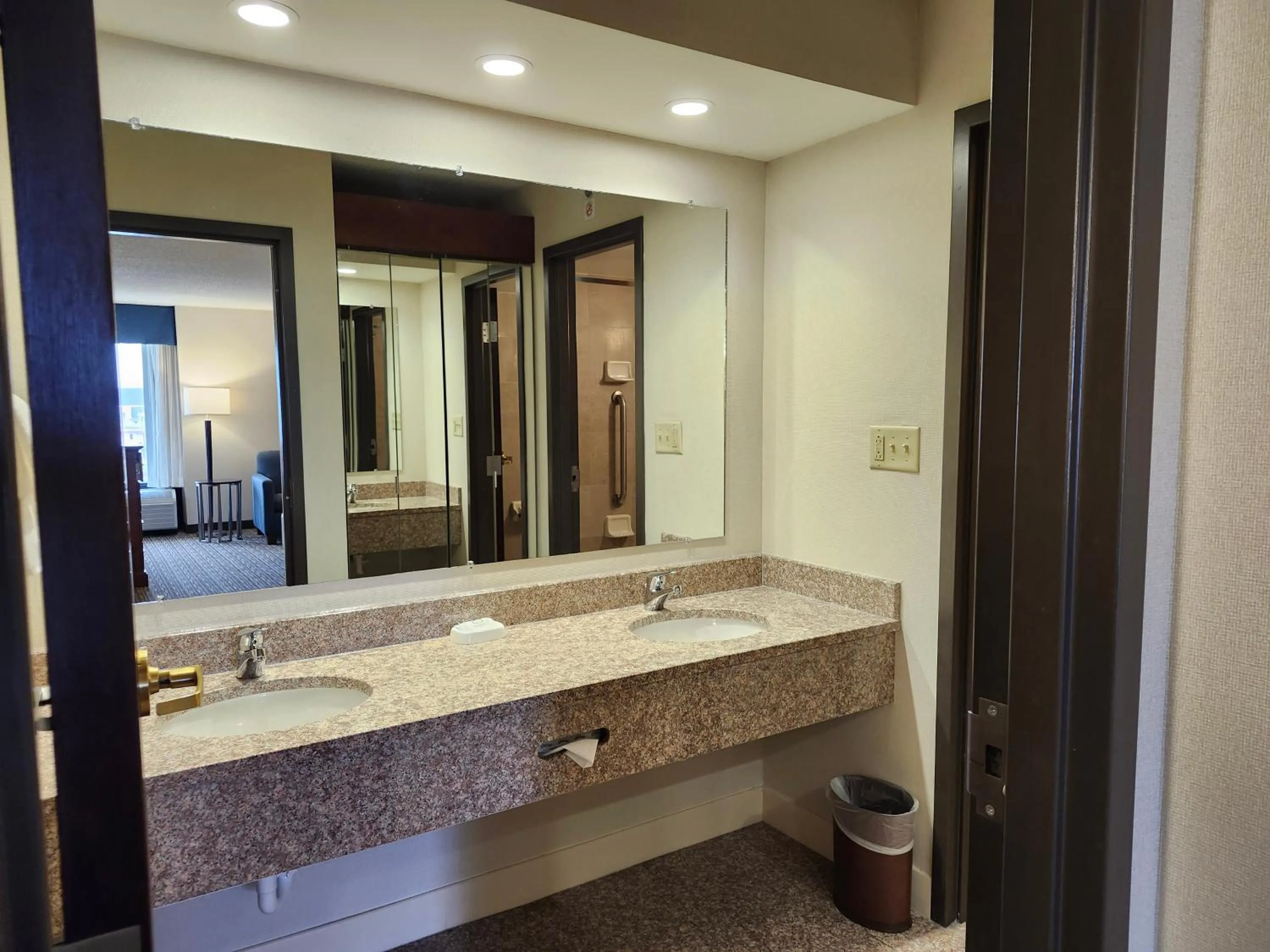 Bathroom in Heritage Inn & Suites St Louis Fenton, Trademark by Wyndham