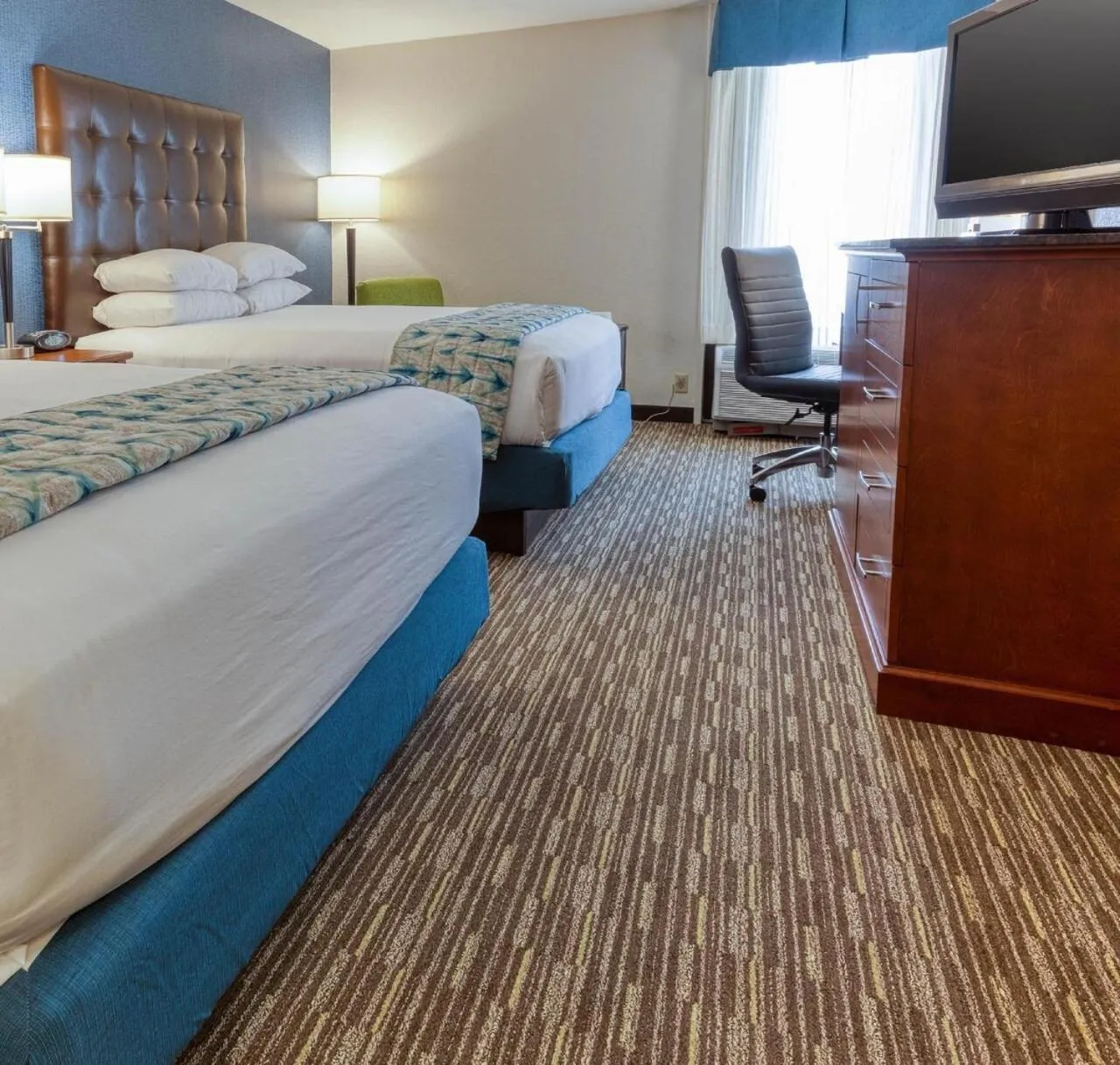 Bed in Heritage Inn & Suites St Louis Fenton, Trademark by Wyndham