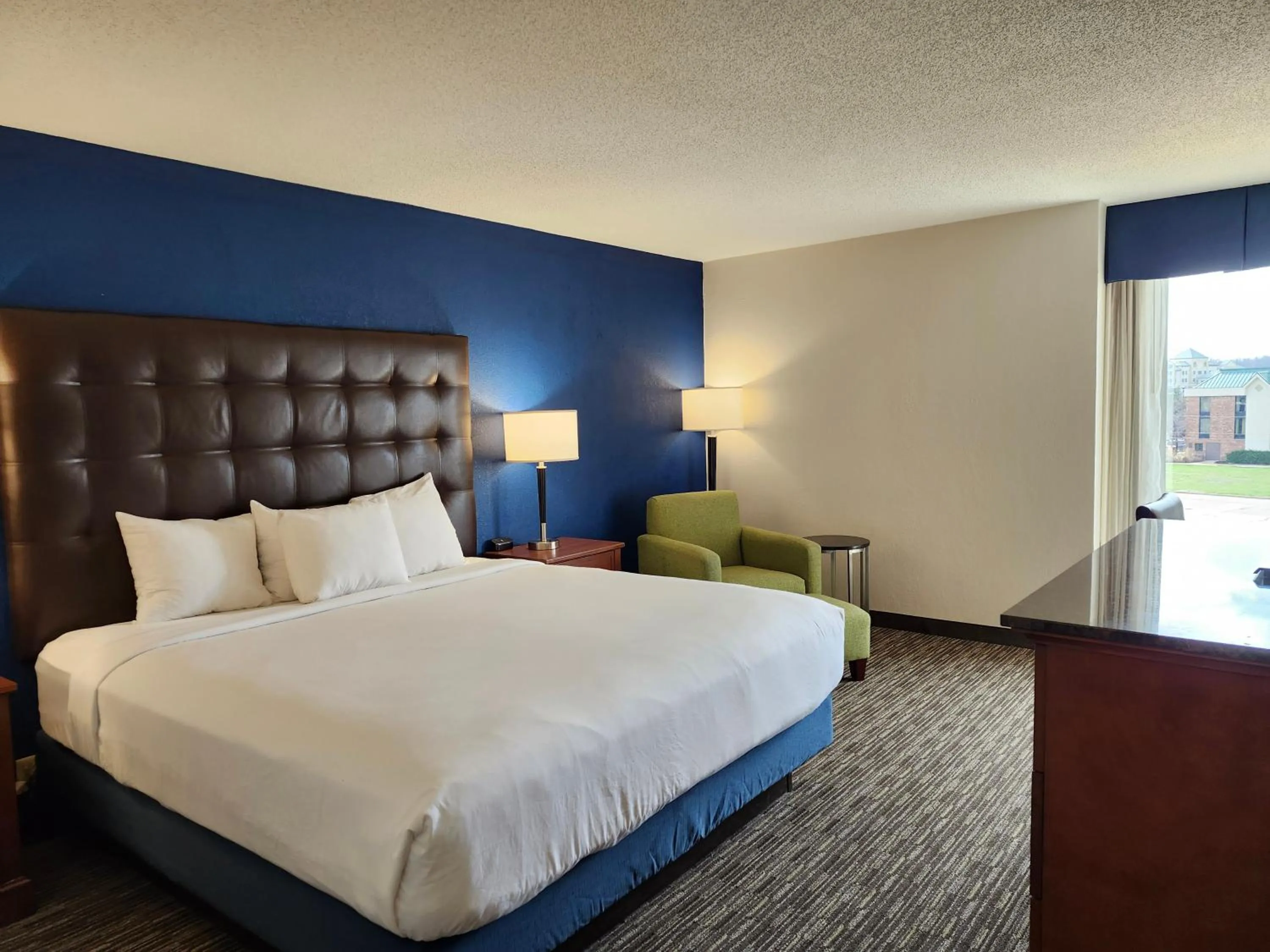 Bed in Heritage Inn & Suites St Louis Fenton, Trademark by Wyndham