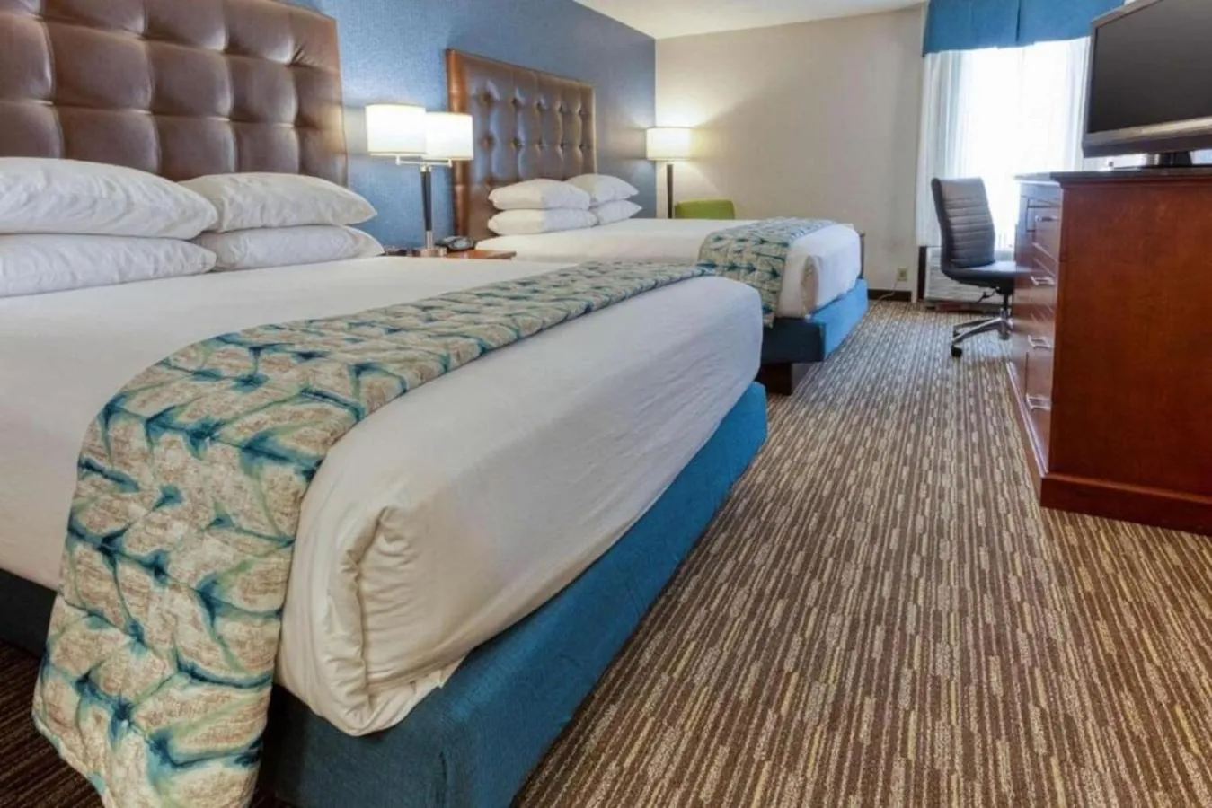 Bed in Heritage Inn & Suites St Louis Fenton, Trademark by Wyndham