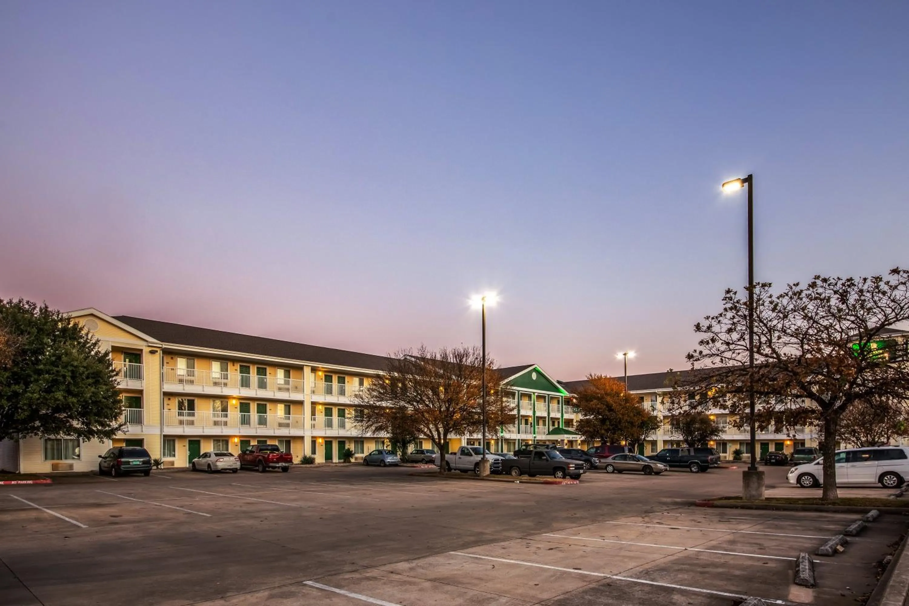 Property building in HomeTowne Studios by Red Roof Austin