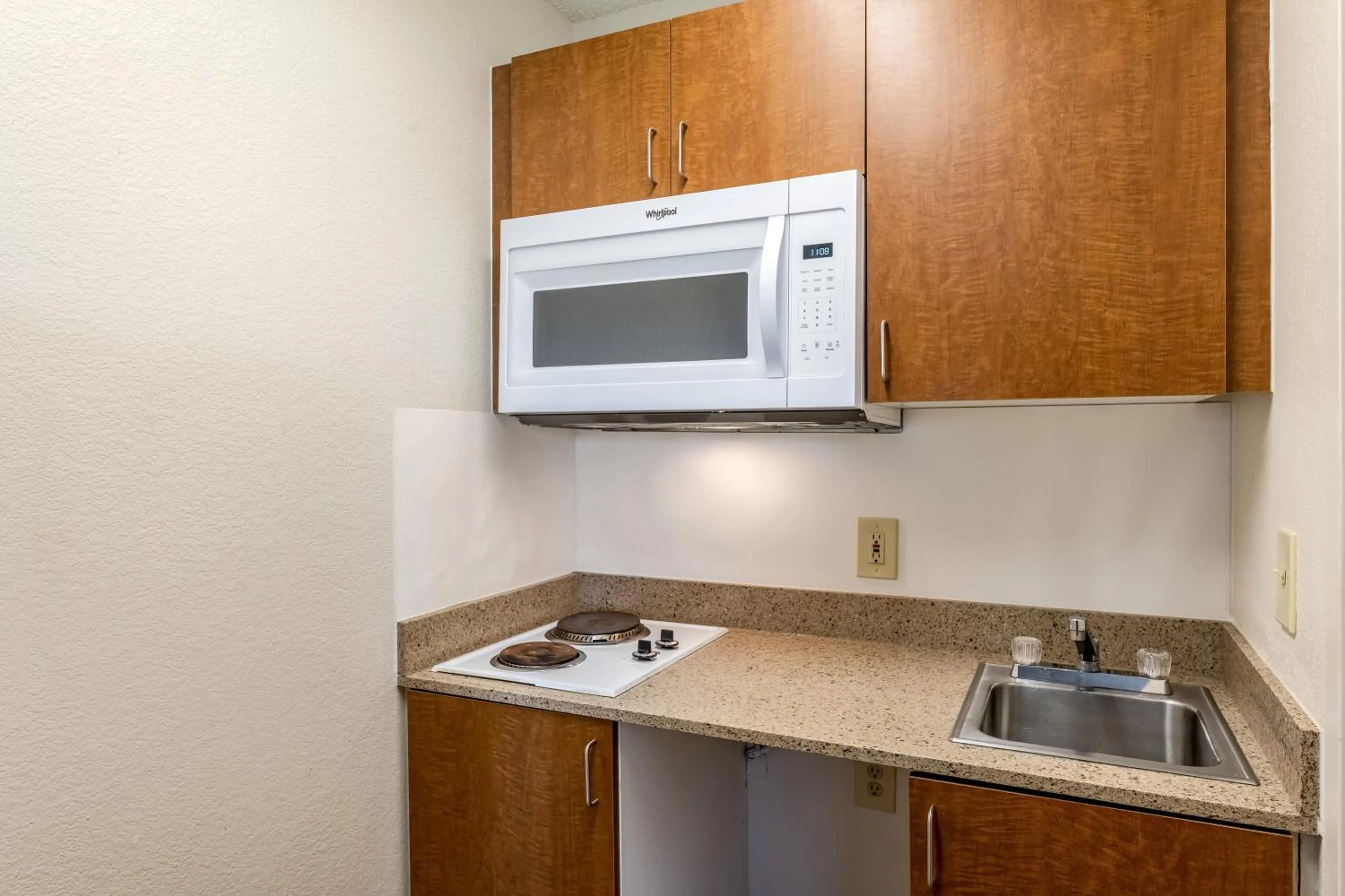 Photo of the whole room in HomeTowne Studios by Red Roof Austin