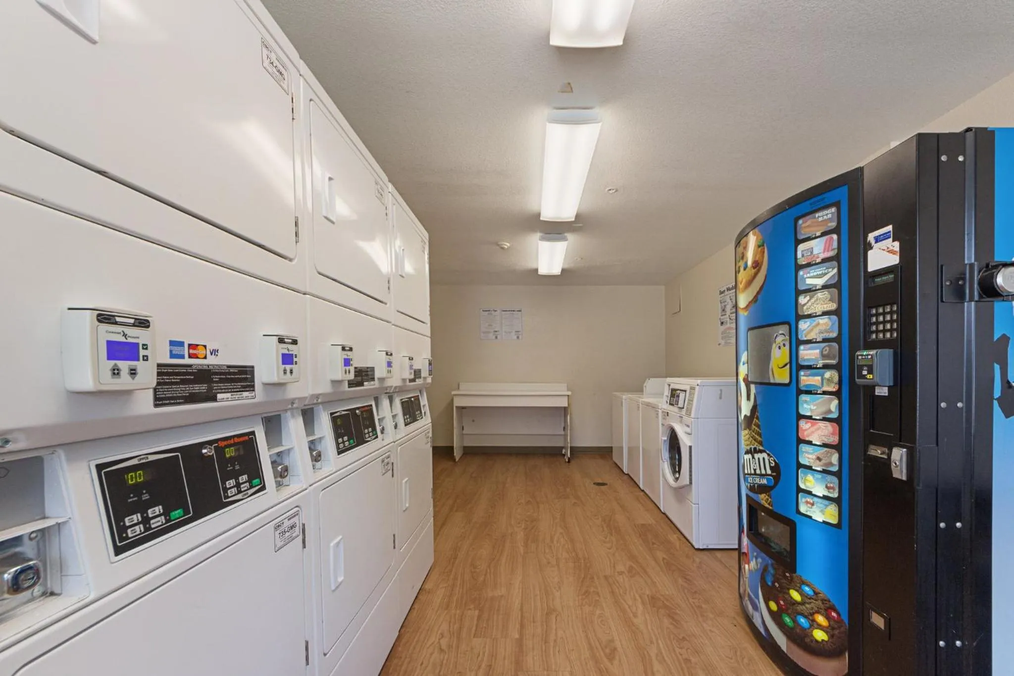 laundry in HomeTowne Studios by Red Roof Dallas - Irving