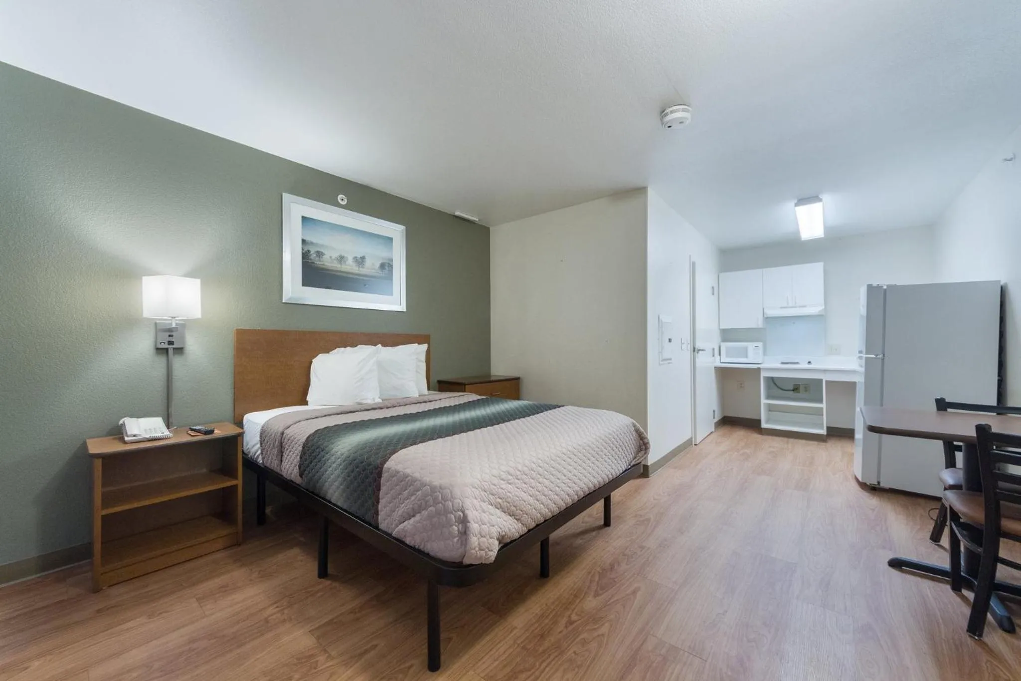 Bedroom, Bed in HomeTowne Studios by Red Roof Dallas - Irving