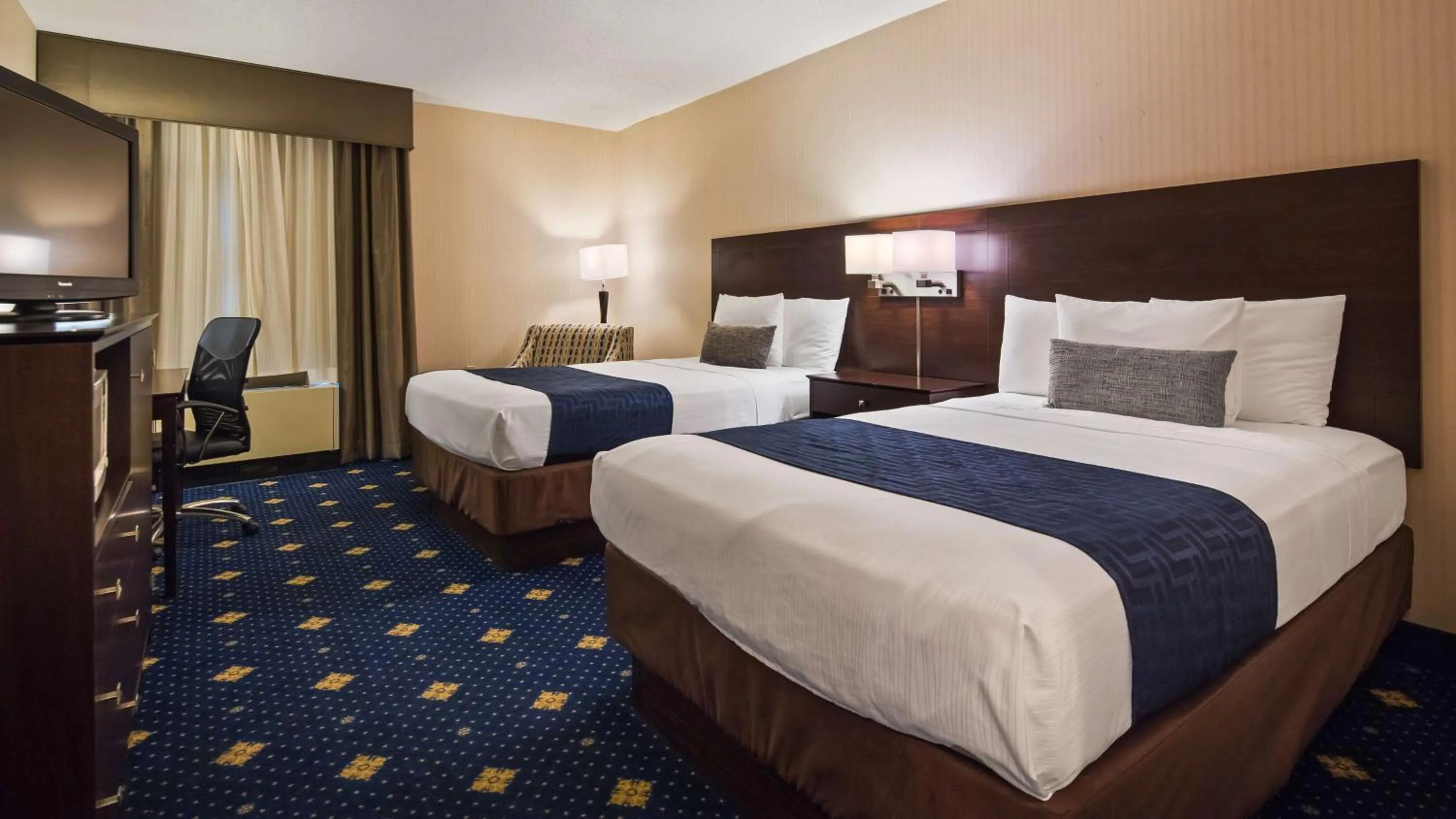 Photo of the whole room, Bed in Baymont by Wyndham Groton/Mystic