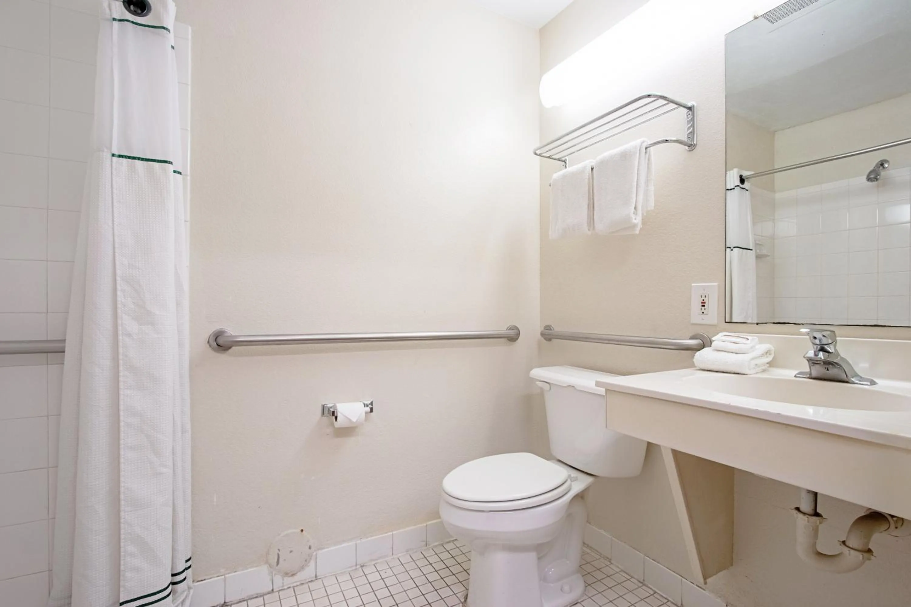 Bathroom in HomeTowne Studios by Red Roof Phoenix - Dunlap Ave