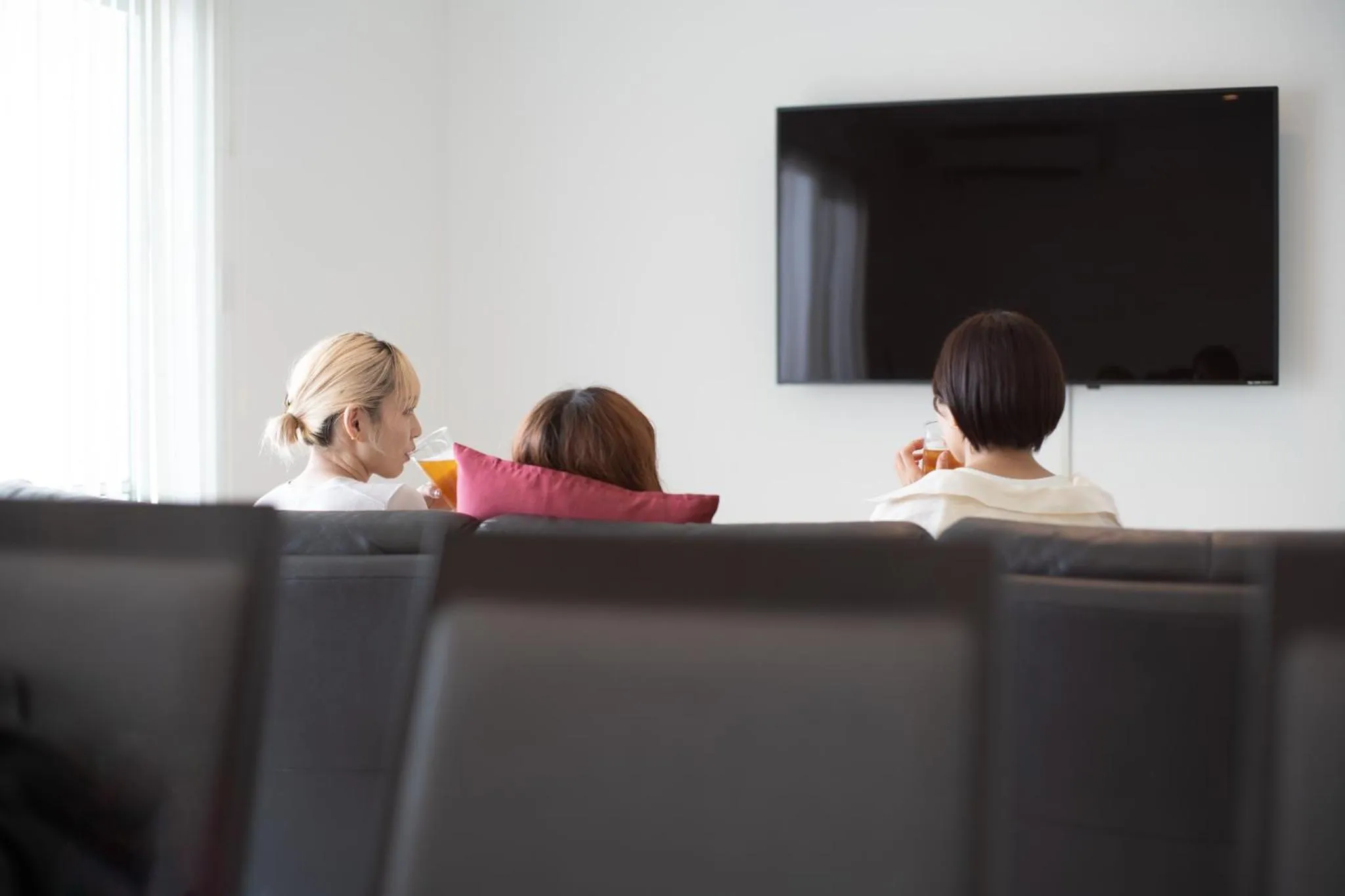 Communal lounge/ TV room in Jacuzzi Terrace Okinawa IMS