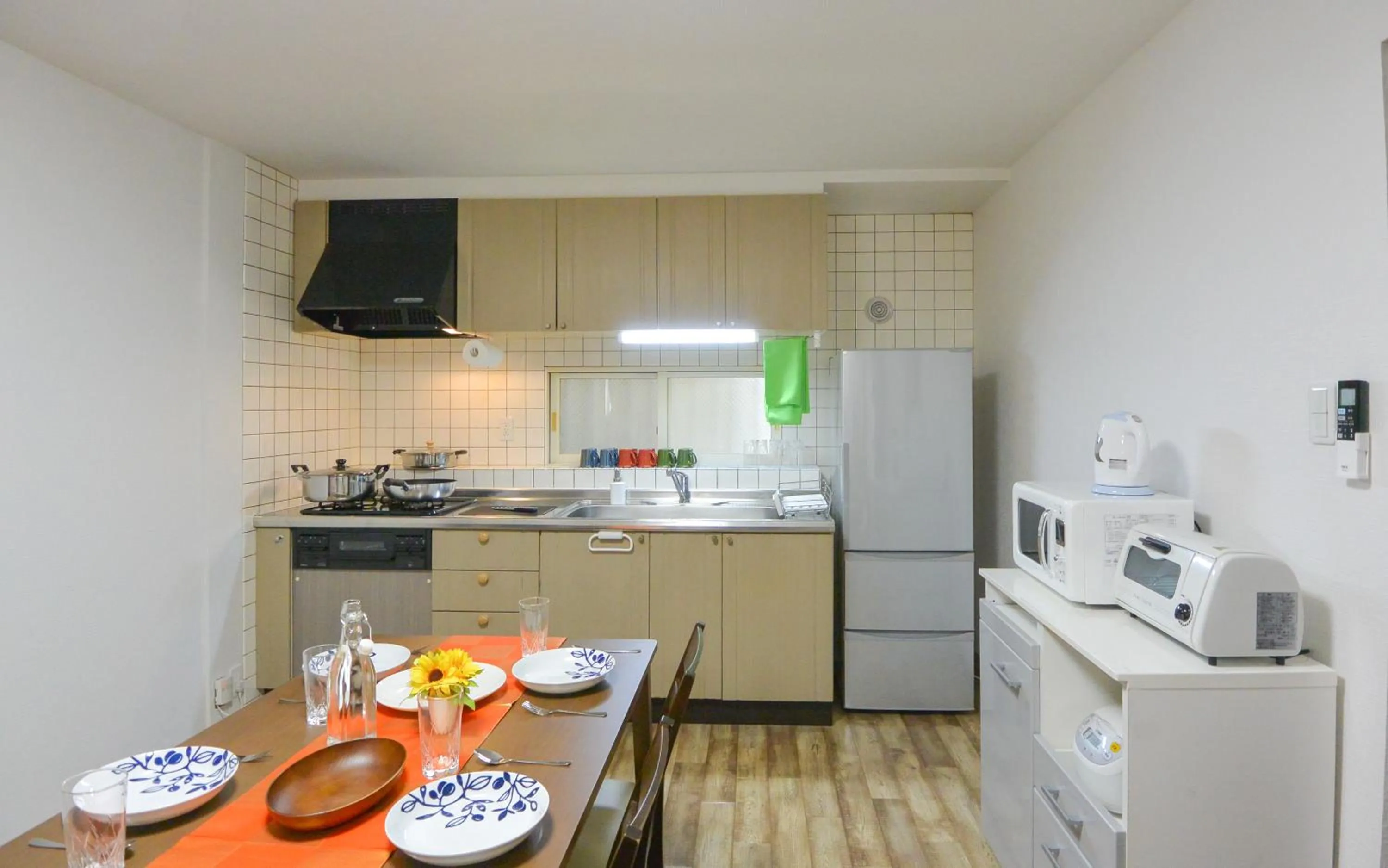Kitchen or kitchenette in KIYAZA Home Sapporo
