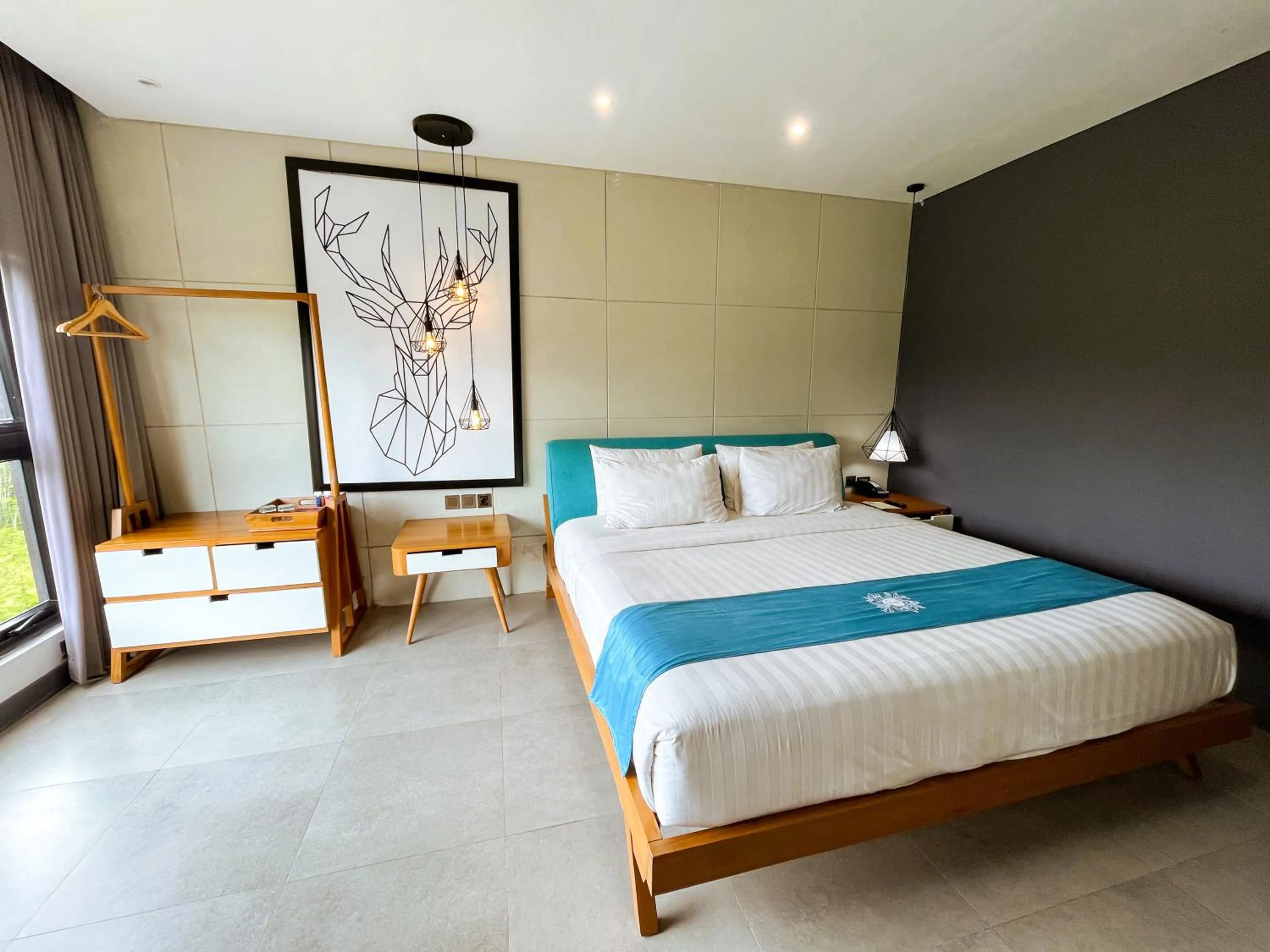 Bed in Hotel Dafam Wonosobo