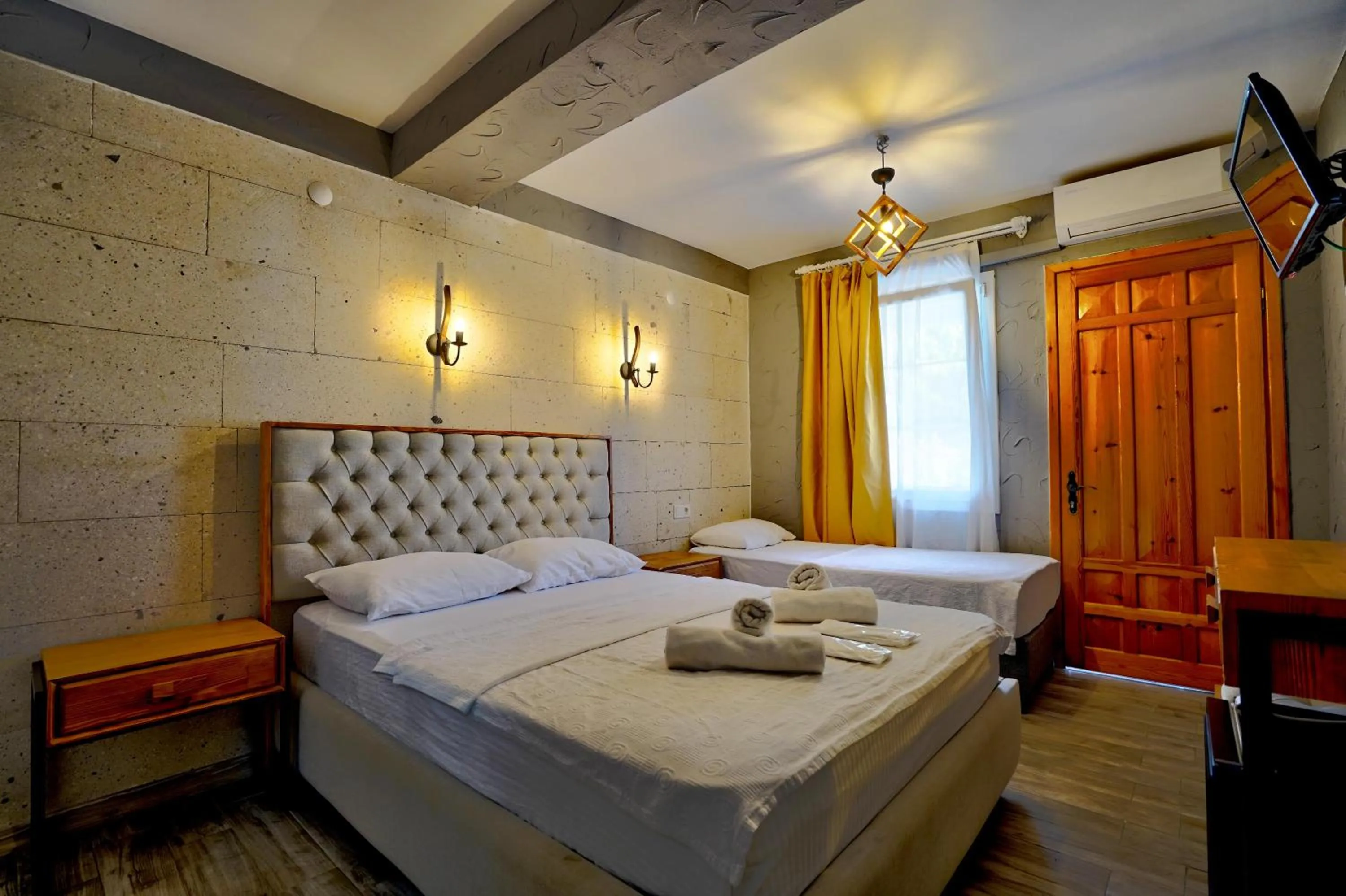 Bed in La Mira Suites