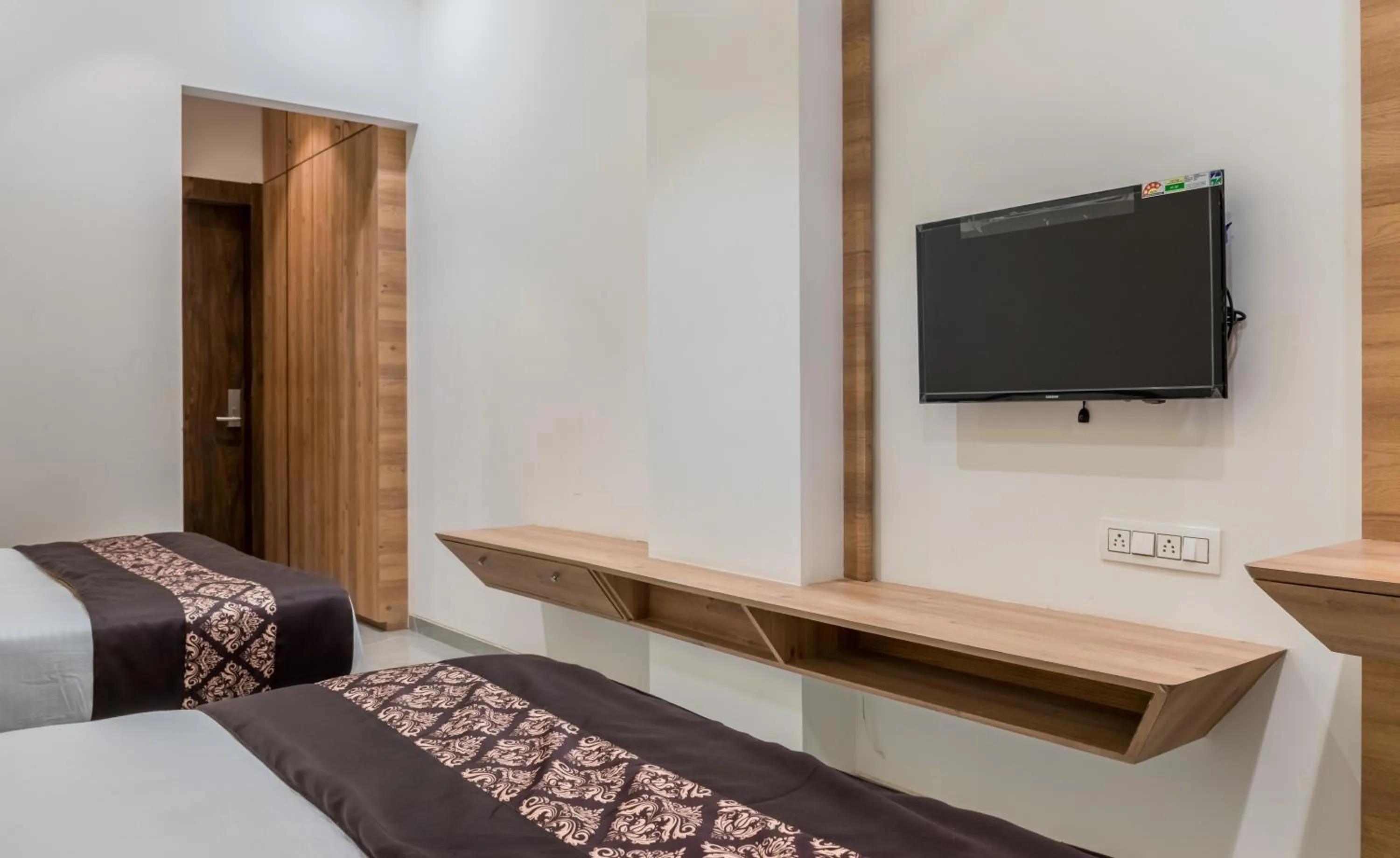 Bed in Meridian Hotel & Banquet