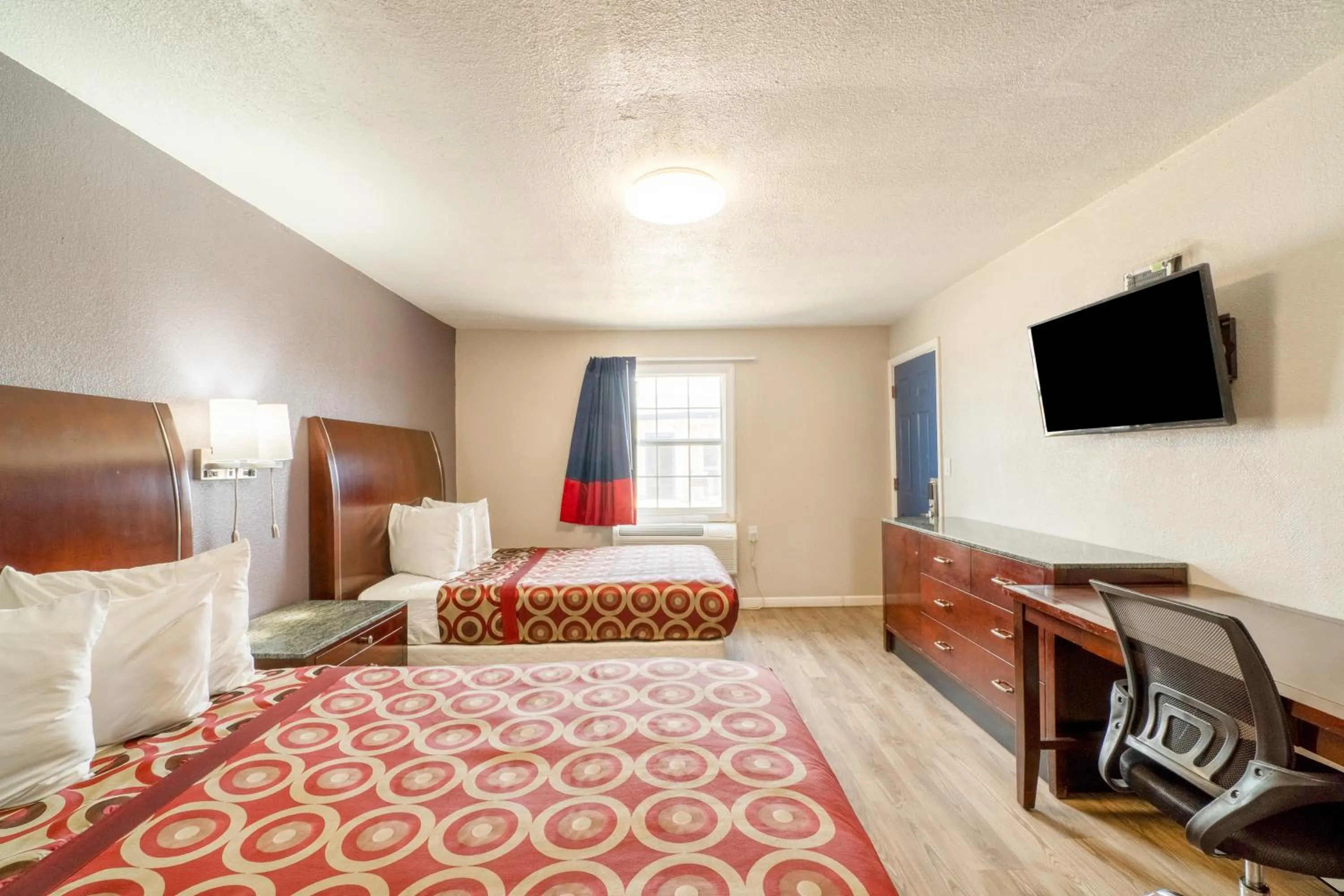 Bedroom, Bed in Economy Inn By OYO, Lamesa TX