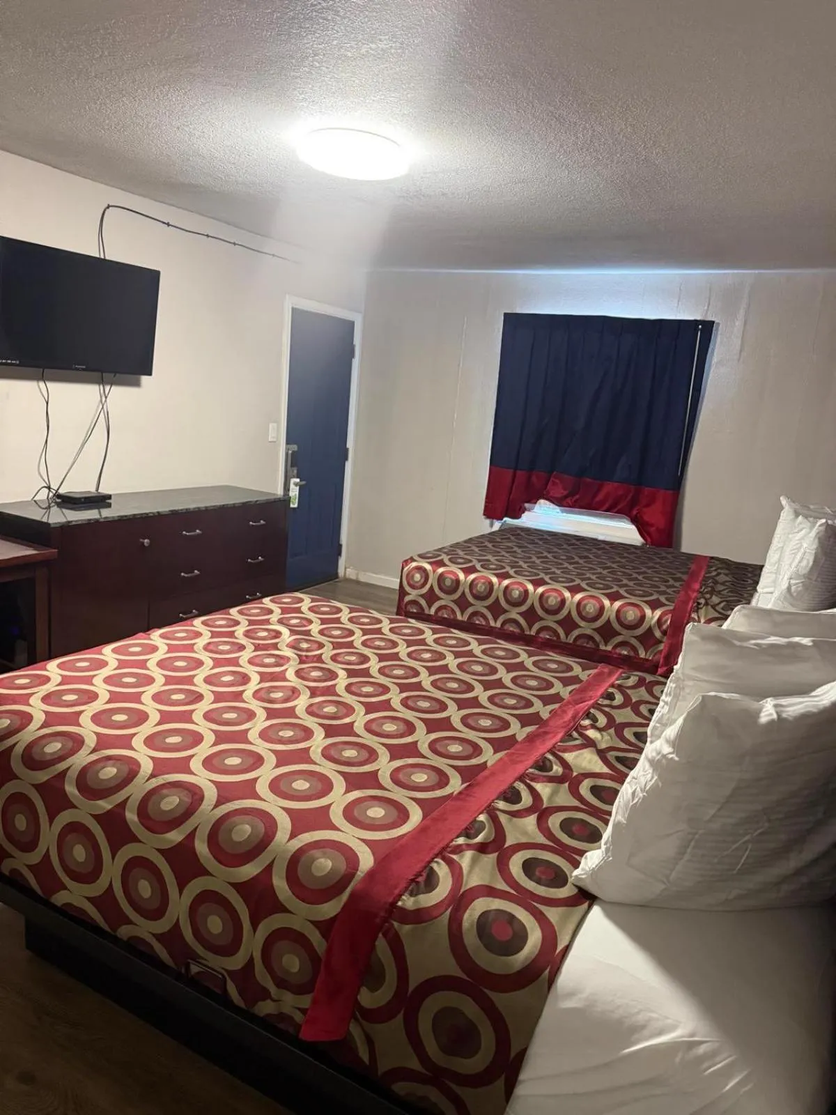 Bedroom, Bed in Economy Inn By OYO, Lamesa TX