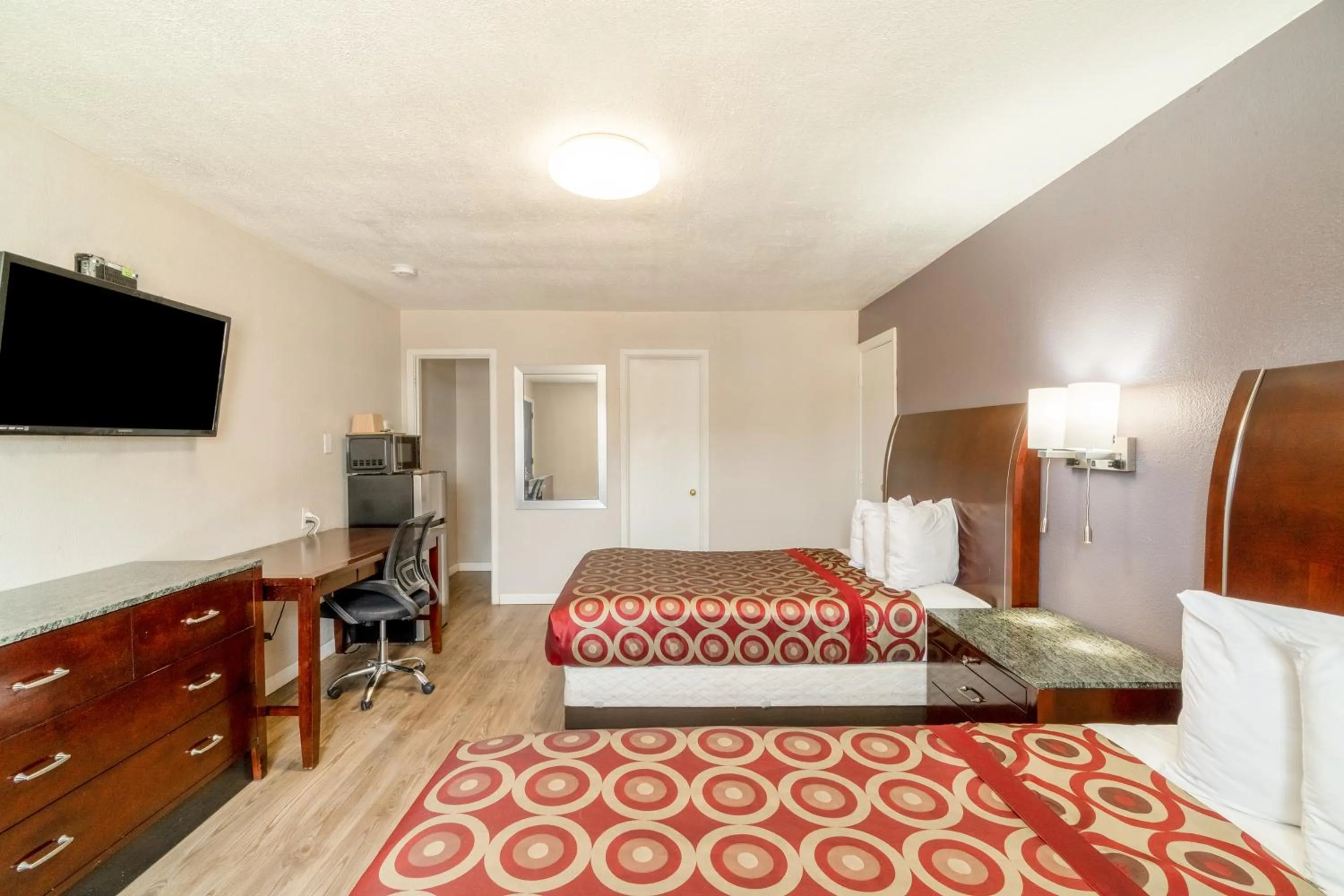 Bedroom, Bed in Economy Inn By OYO, Lamesa TX