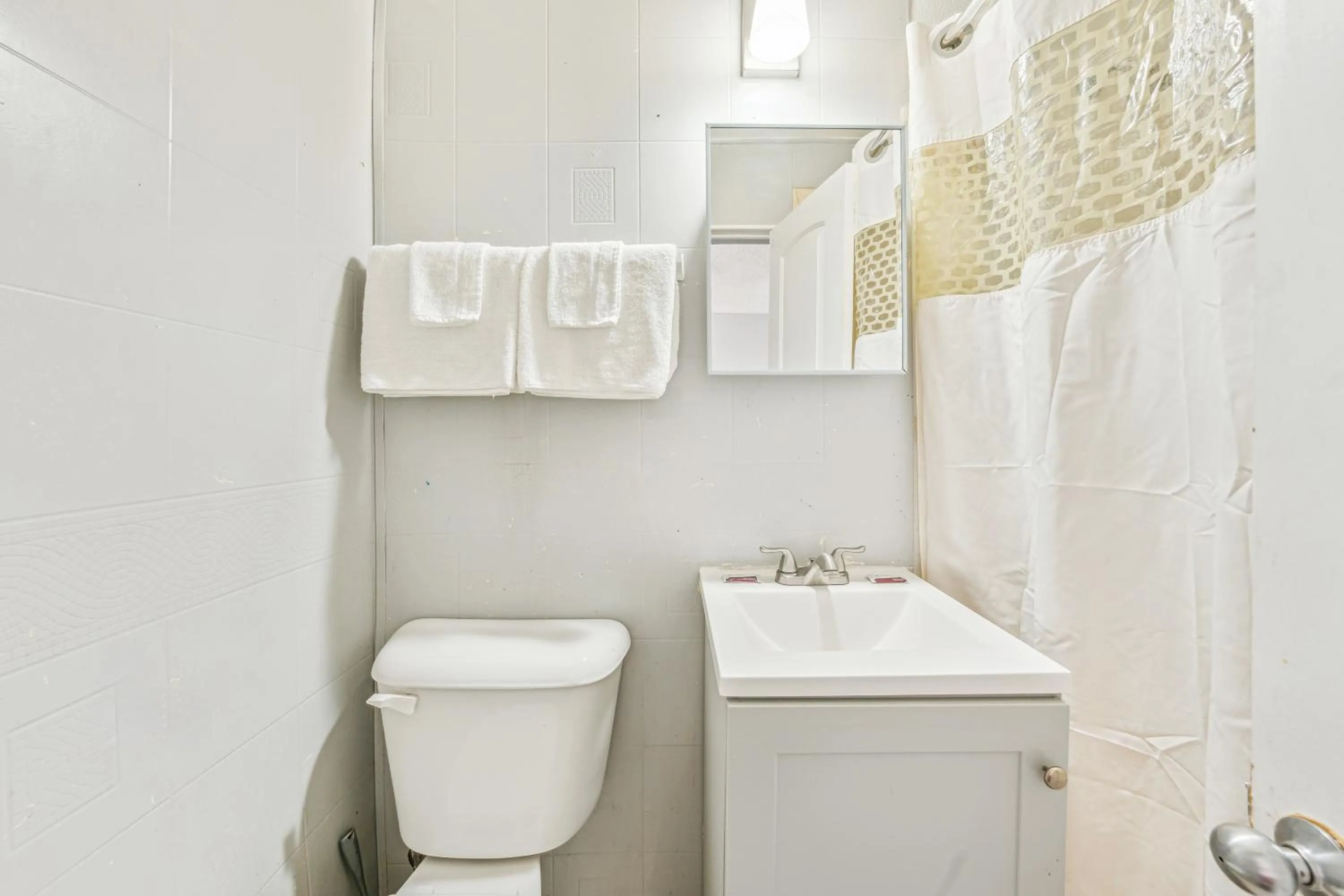 Bathroom in Flint Motel by OYO MI Near I-475