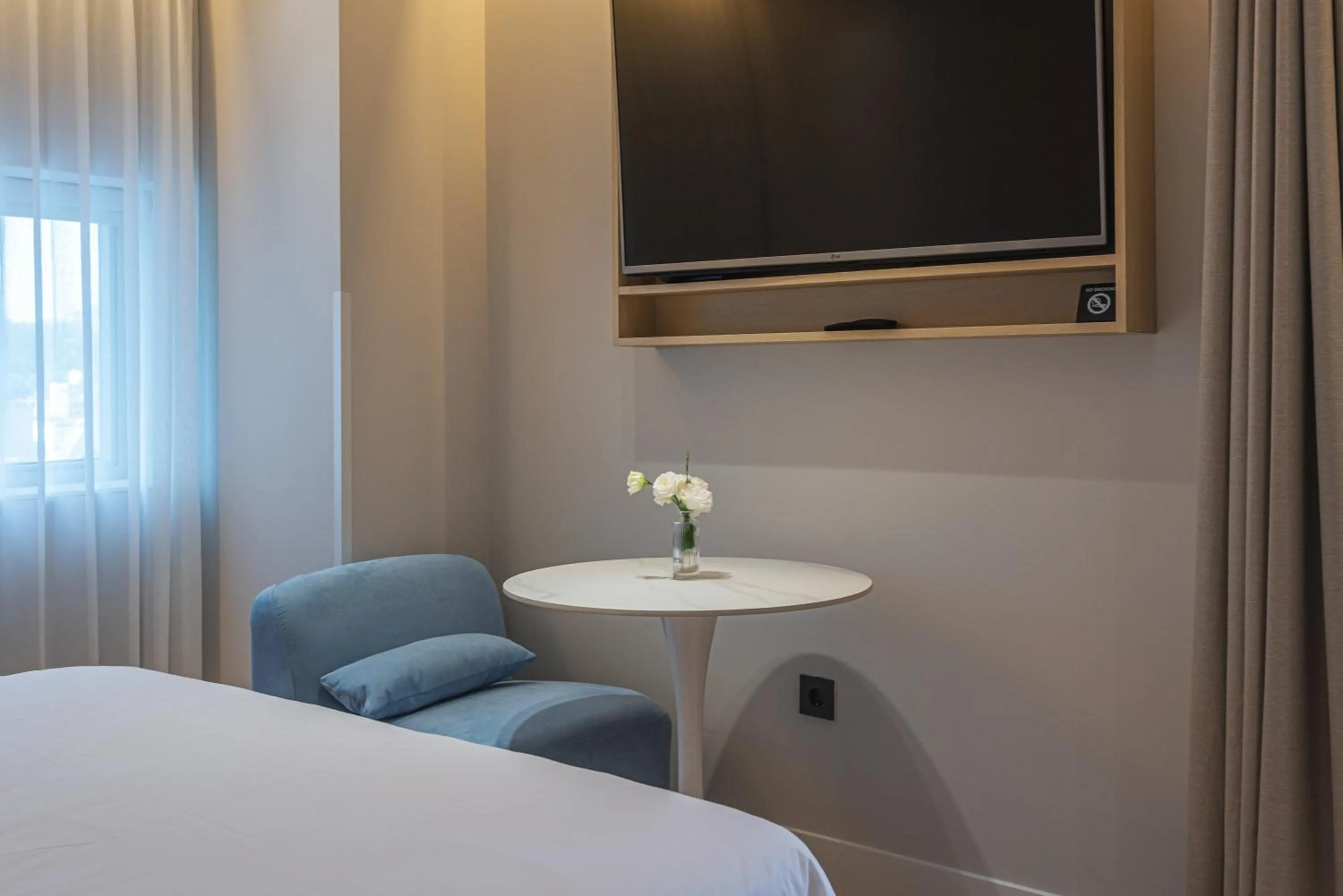 Seating area, Bed in Hotel Marine view