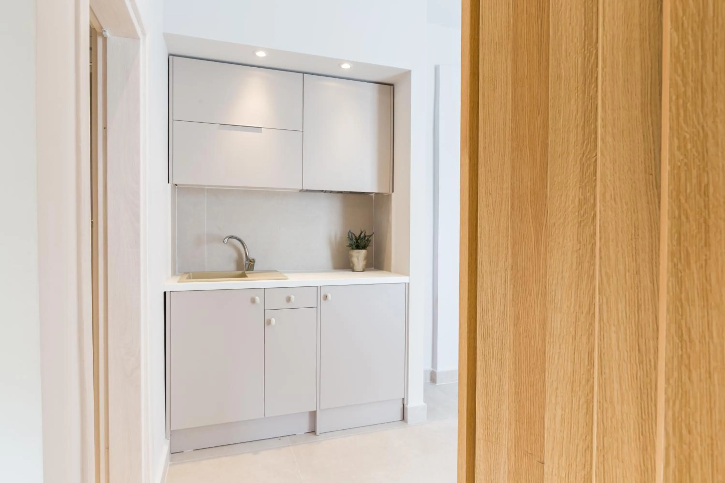 Kitchen or kitchenette in Calmare suites