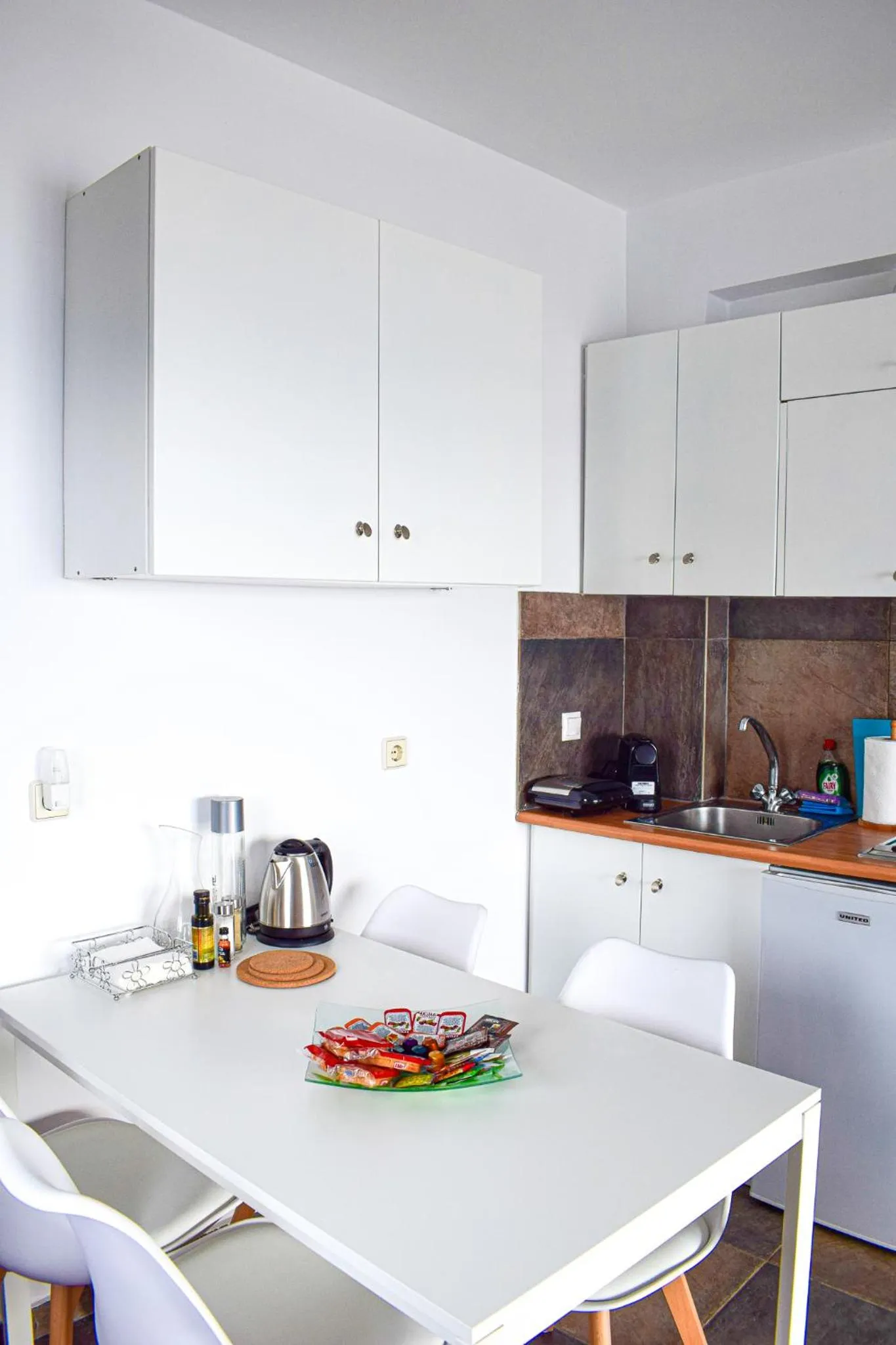 Dining area in Muses seaside Villas