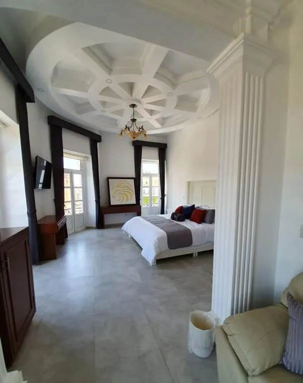 Bed in Hotel Estancia Real