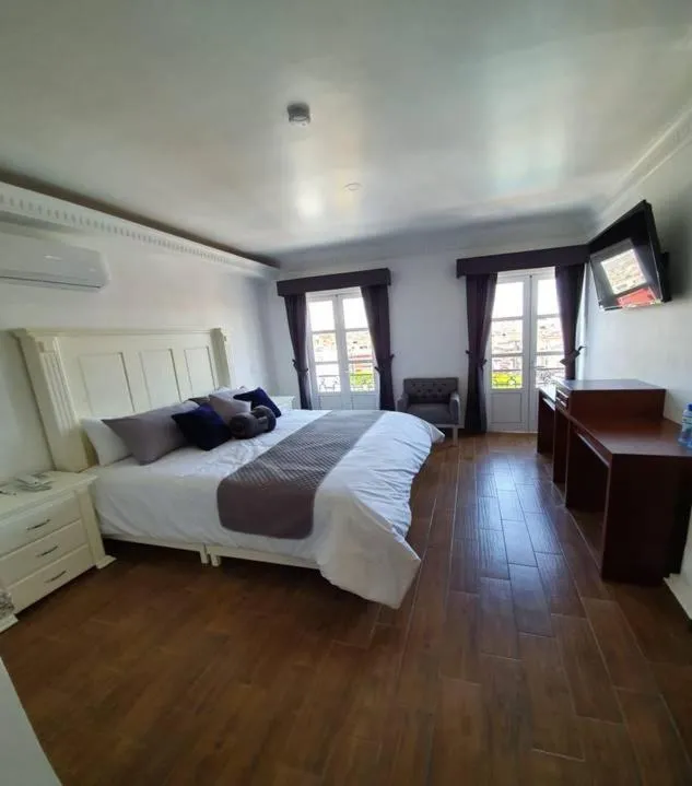 Bed in Hotel Estancia Real