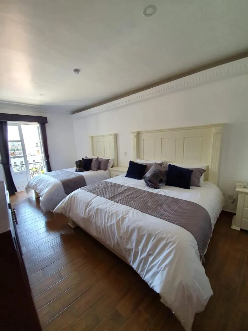 Bed in Hotel Estancia Real