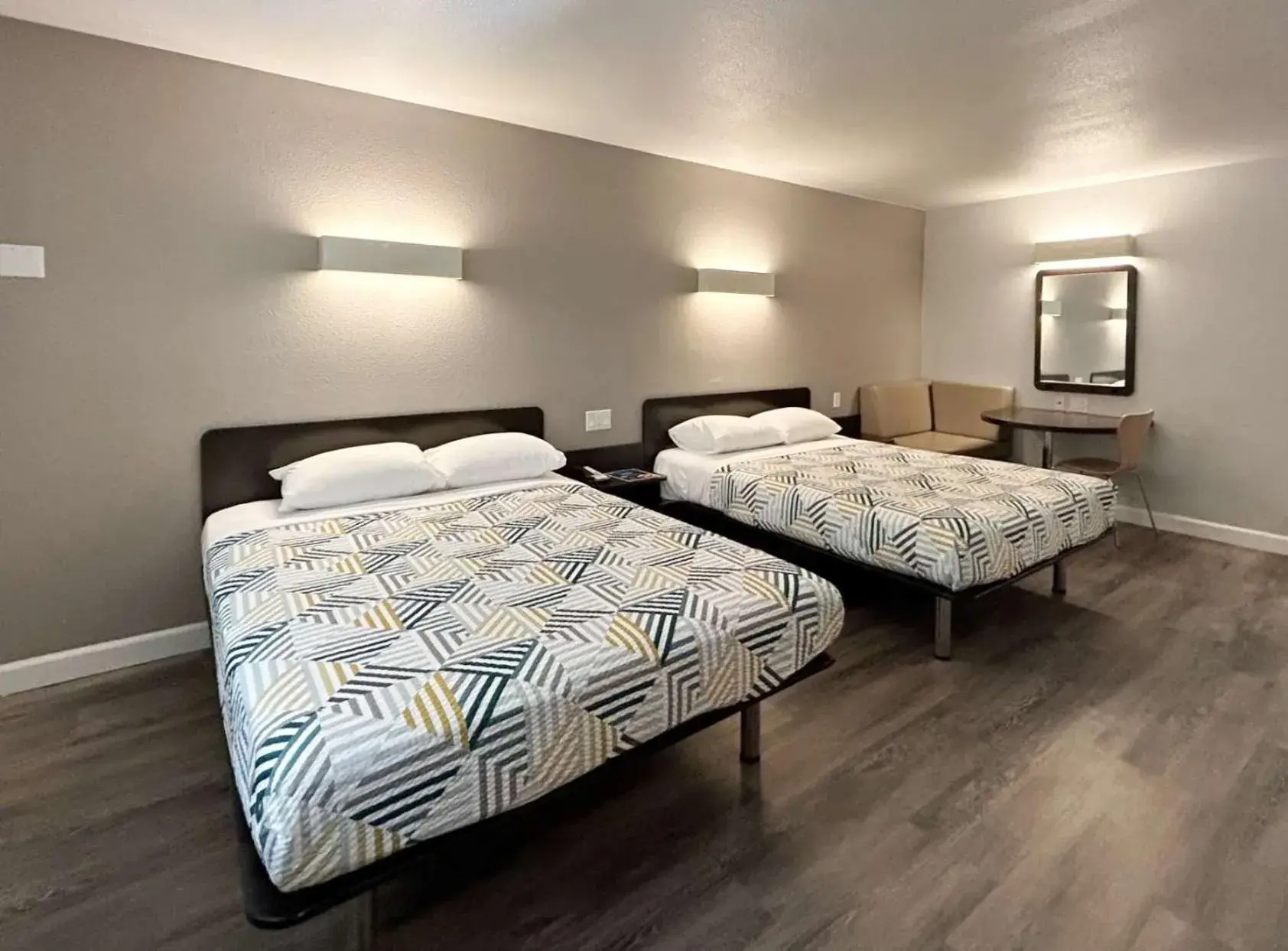 Queen Room with Two Queen Beds - single occupancy - Disability Access - Roll In Shower in Motel 6-Anaheim, CA Queen Room with Two Queen Beds - single occupancy - Disability Access - Roll In Shower in Motel 6-Anaheim, CA