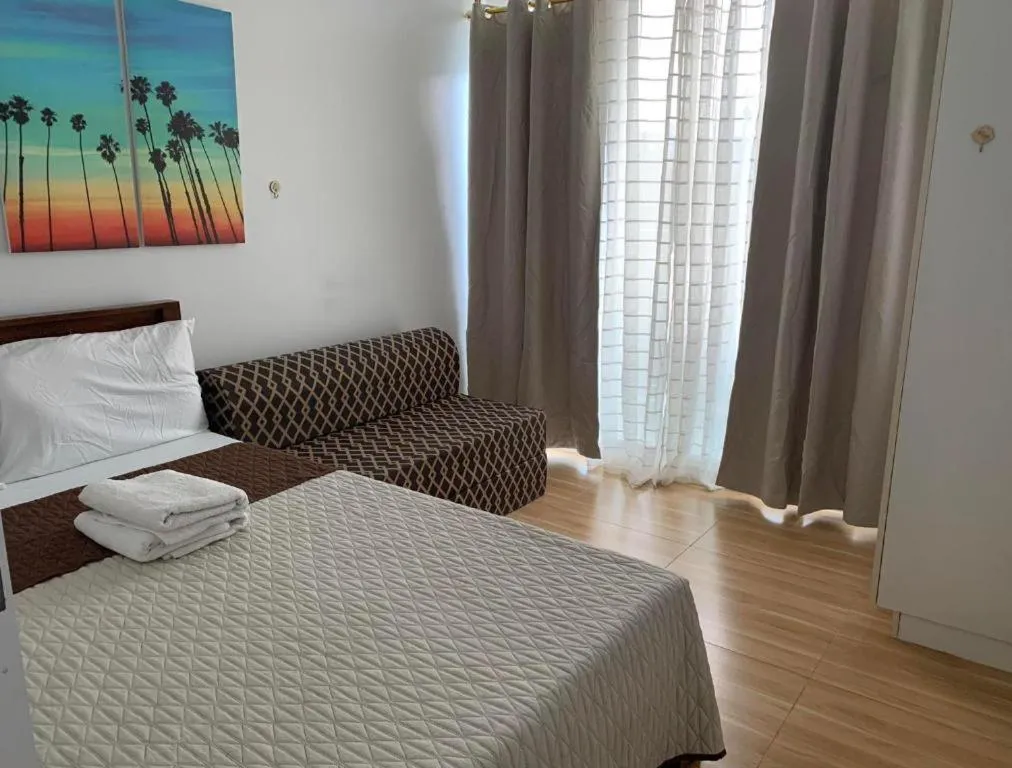 Bed in AZURE C4 BEACHPOOL balcony wifi MULTIPLE UNITS