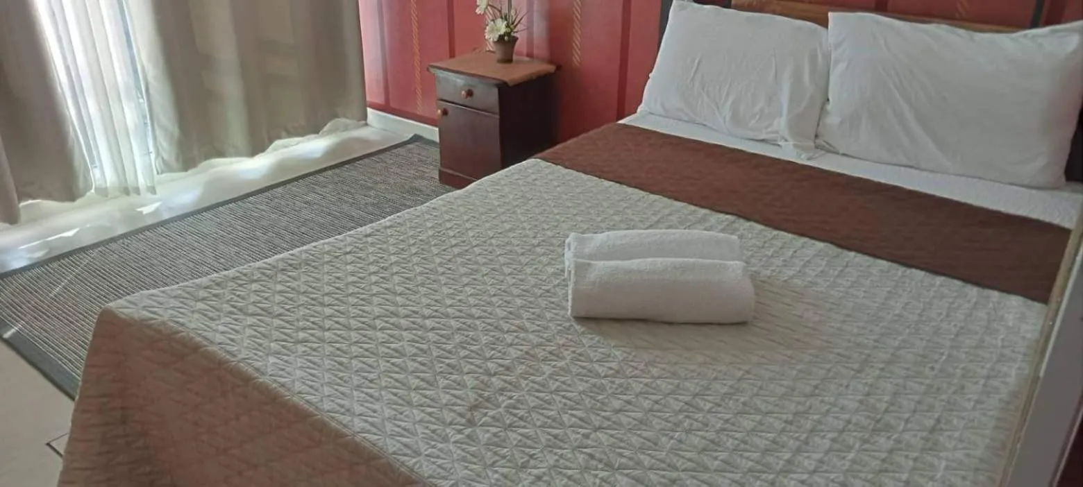 Bed in AZURE C4 BEACHPOOL balcony wifi MULTIPLE UNITS