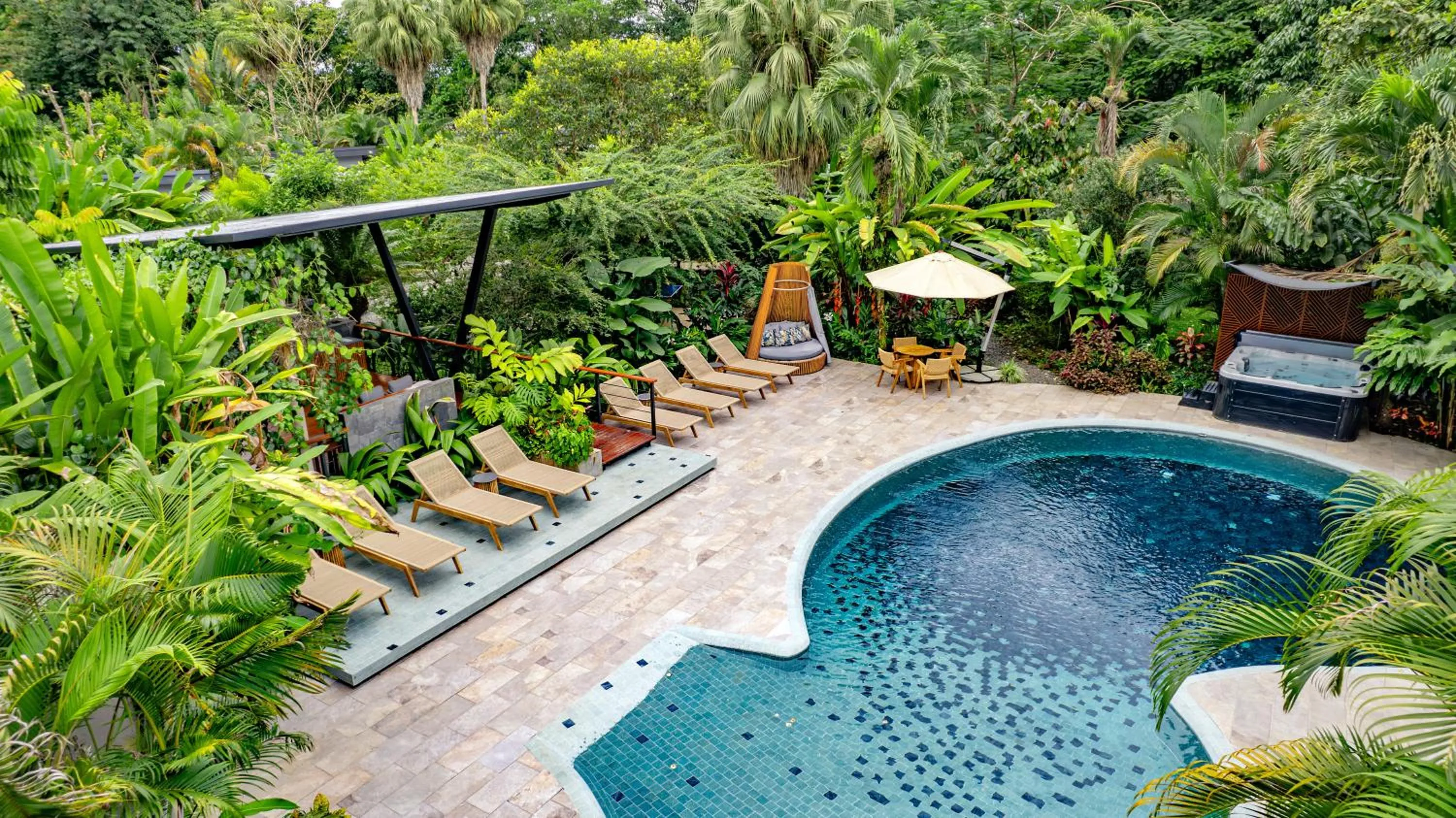 Swimming pool in Noah's Forest Hotel by Tifakara