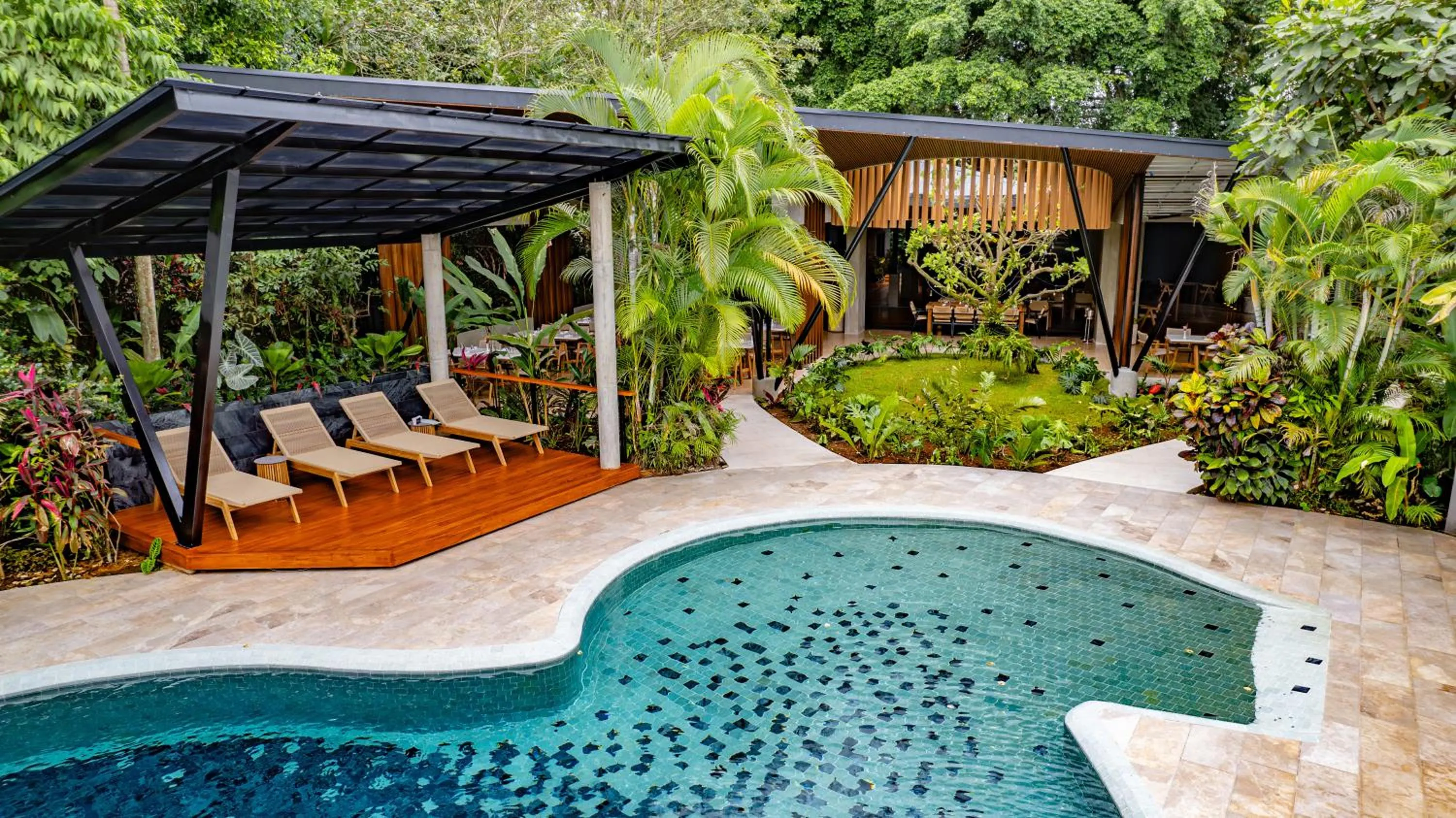 Swimming pool in Noah's Forest Hotel by Tifakara