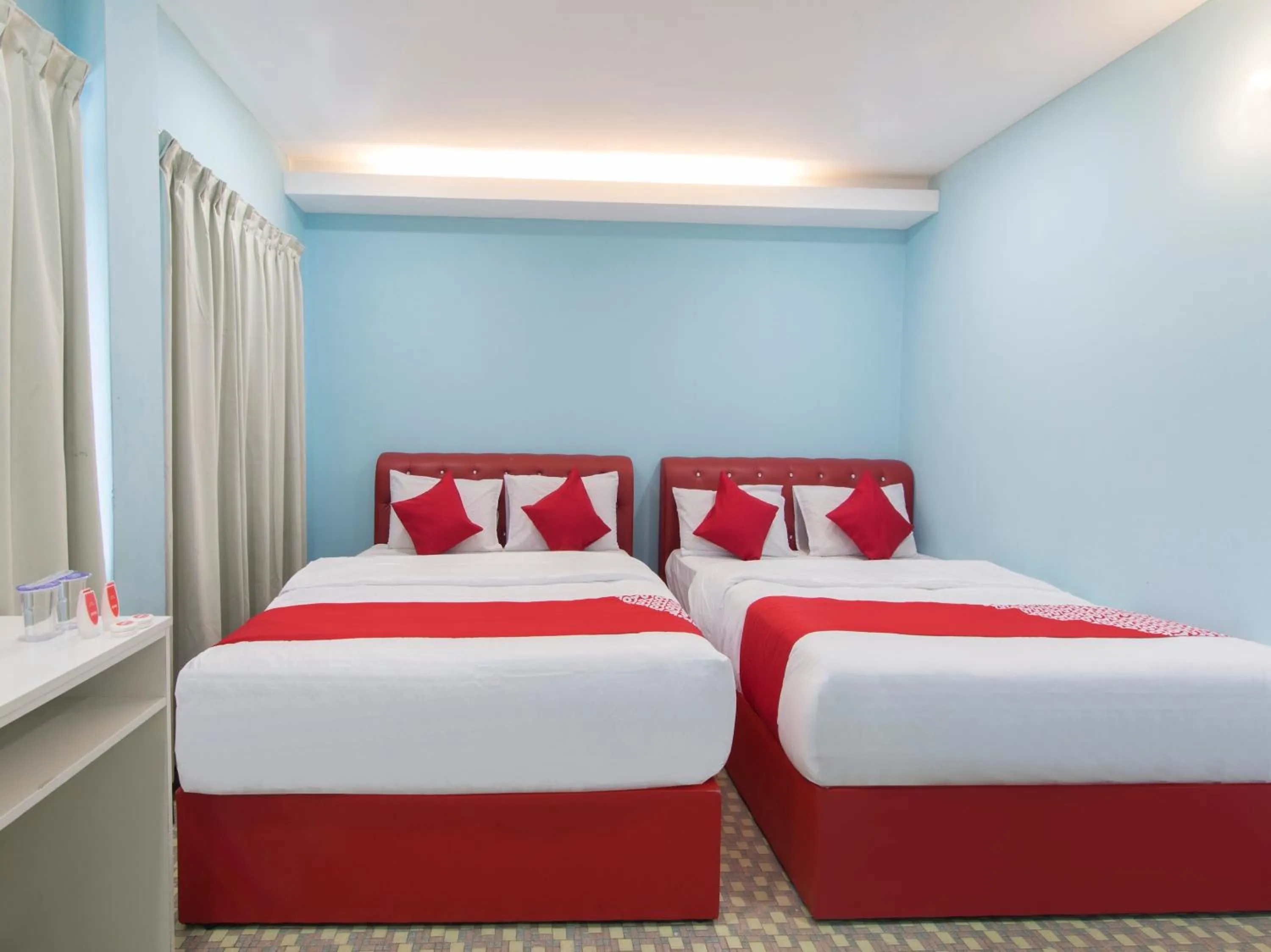 Bedroom in OYO 1136 Pd Star Hotel