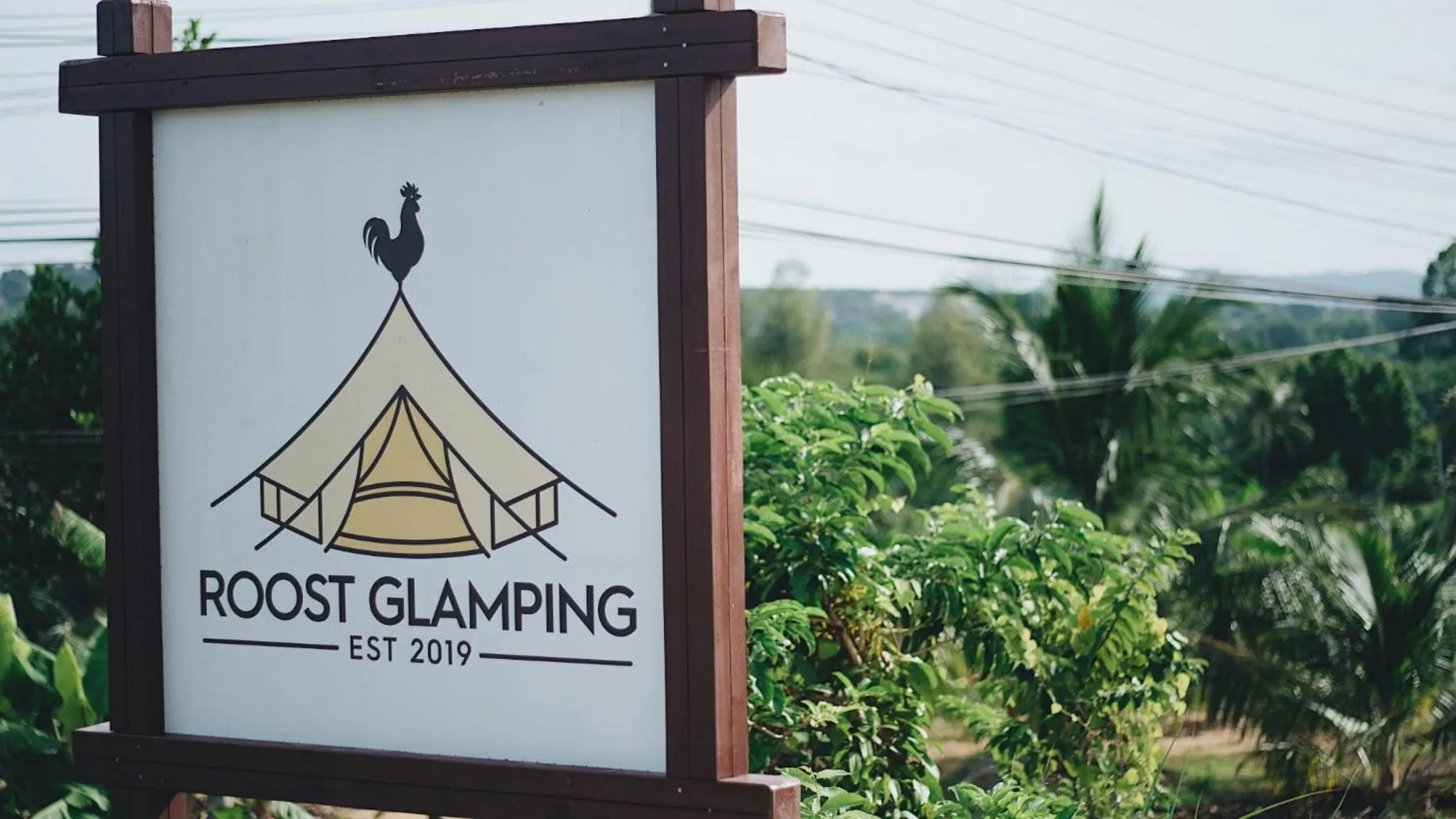Property logo or sign in Roost Glamping - SHA Certified