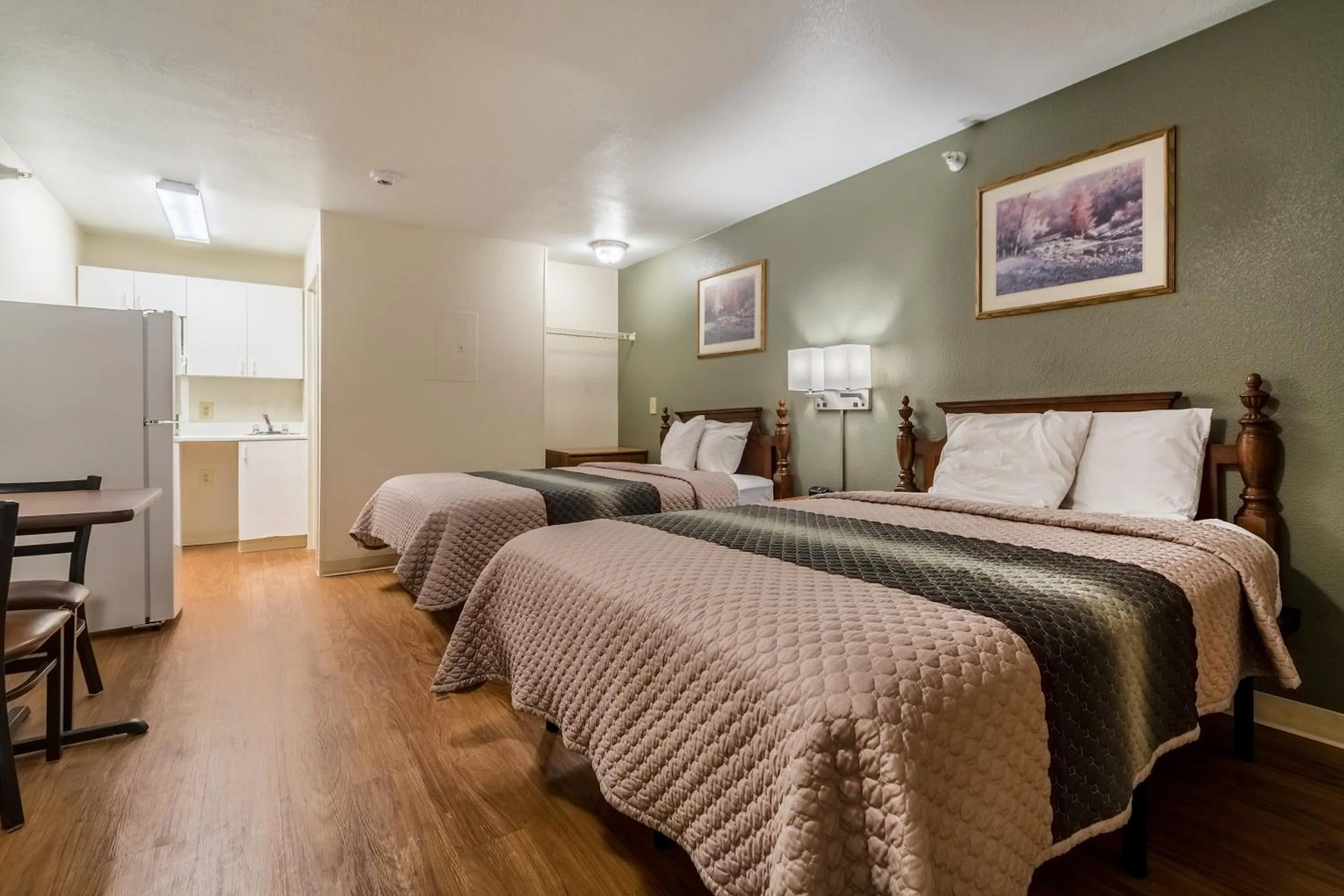 Bedroom, Bed in HomeTowne Studios by Red Roof Denver - Lakewood West