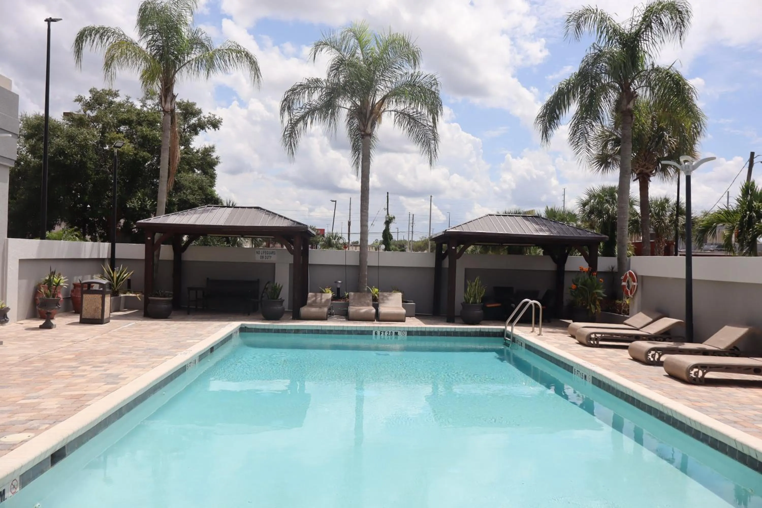 Swimming pool in Holiday Inn Orlando East-UCF Area by IHG