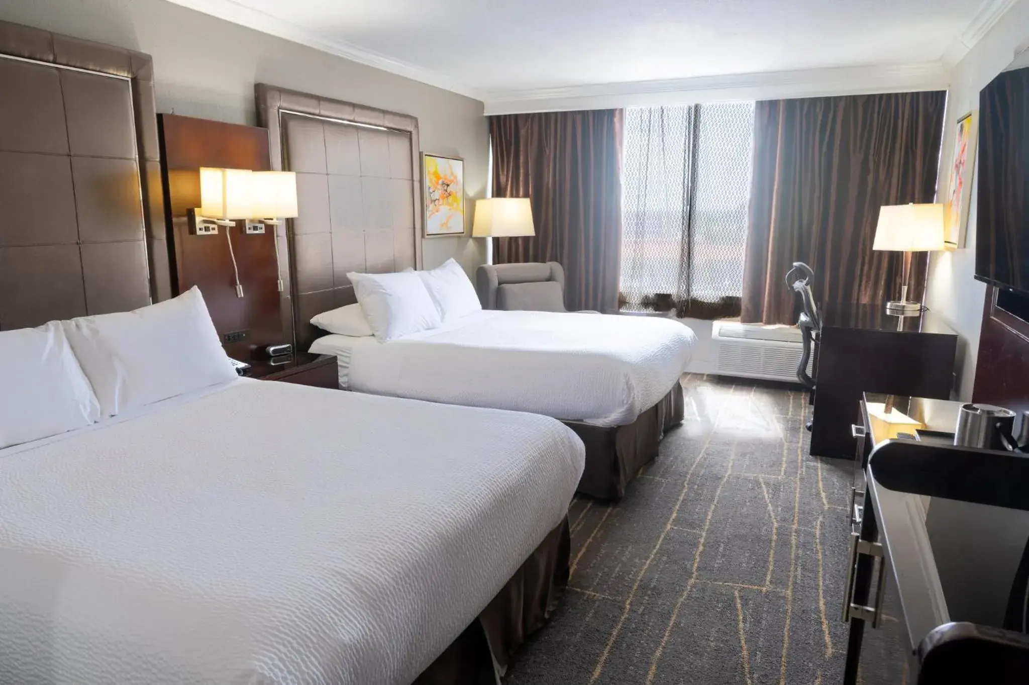 Standard Room with Two Queen Beds in Holiday Inn Orlando East-UCF Area by IHG Standard Room with Two Queen Beds in Holiday Inn Orlando East-UCF Area by IHG