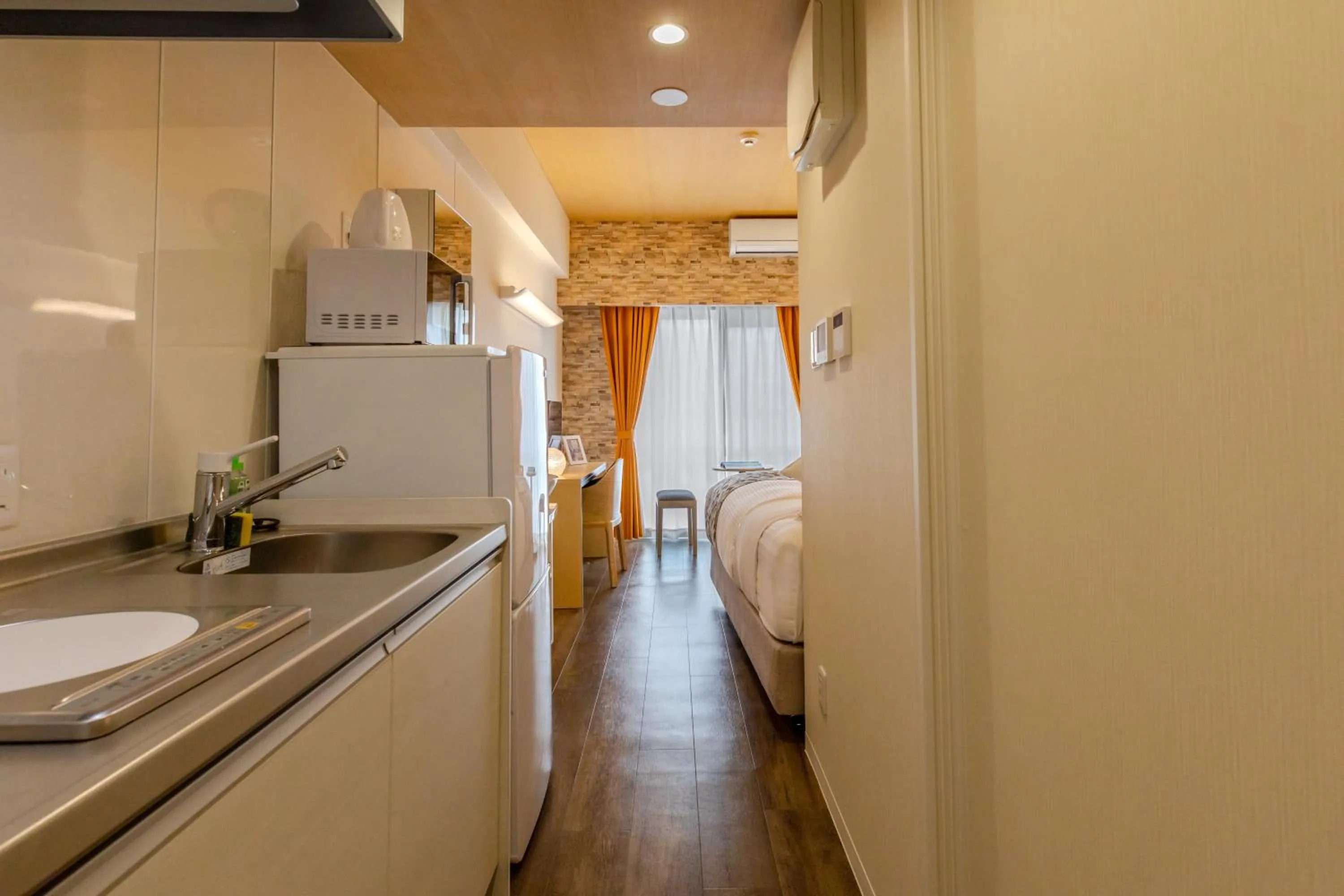 Kitchen/Kitchenette in Mr.KINJO Beach Side Kafu-shi