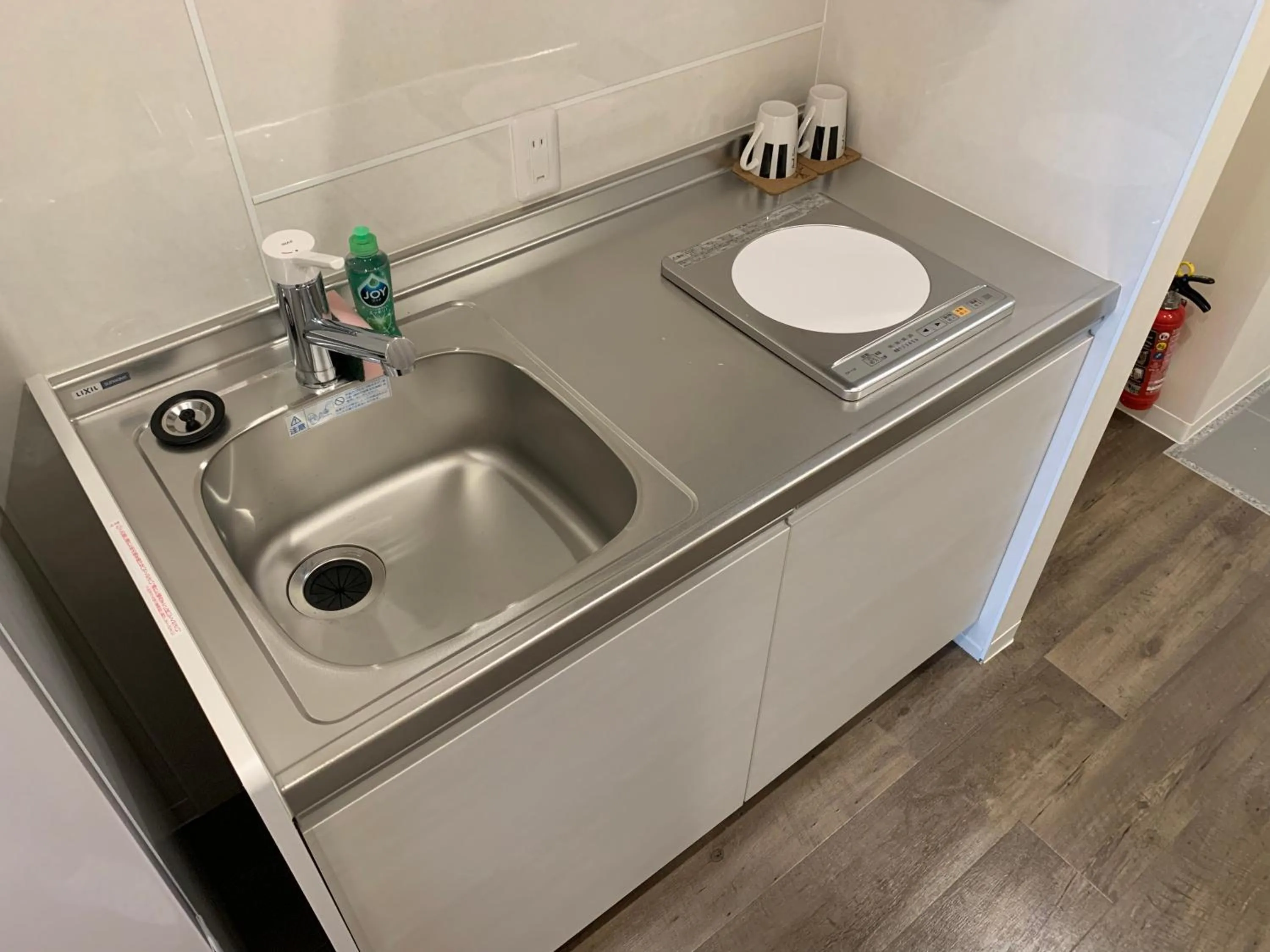 Kitchen or kitchenette, Kitchen/Kitchenette in Mr.KINJO Beach Side Kafu-shi