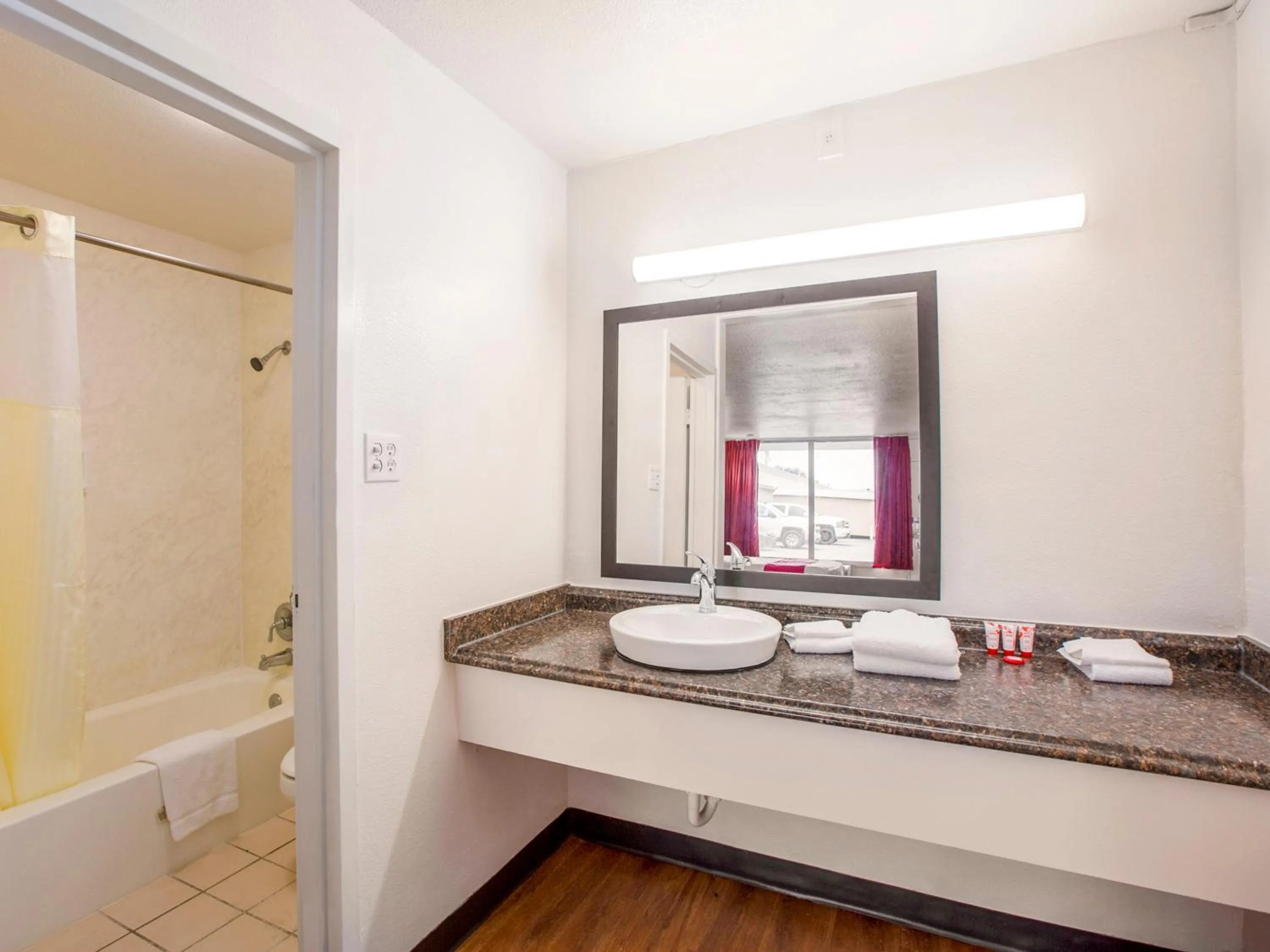 Bathroom in Travelodge by Wyndham Baton Rouge East
