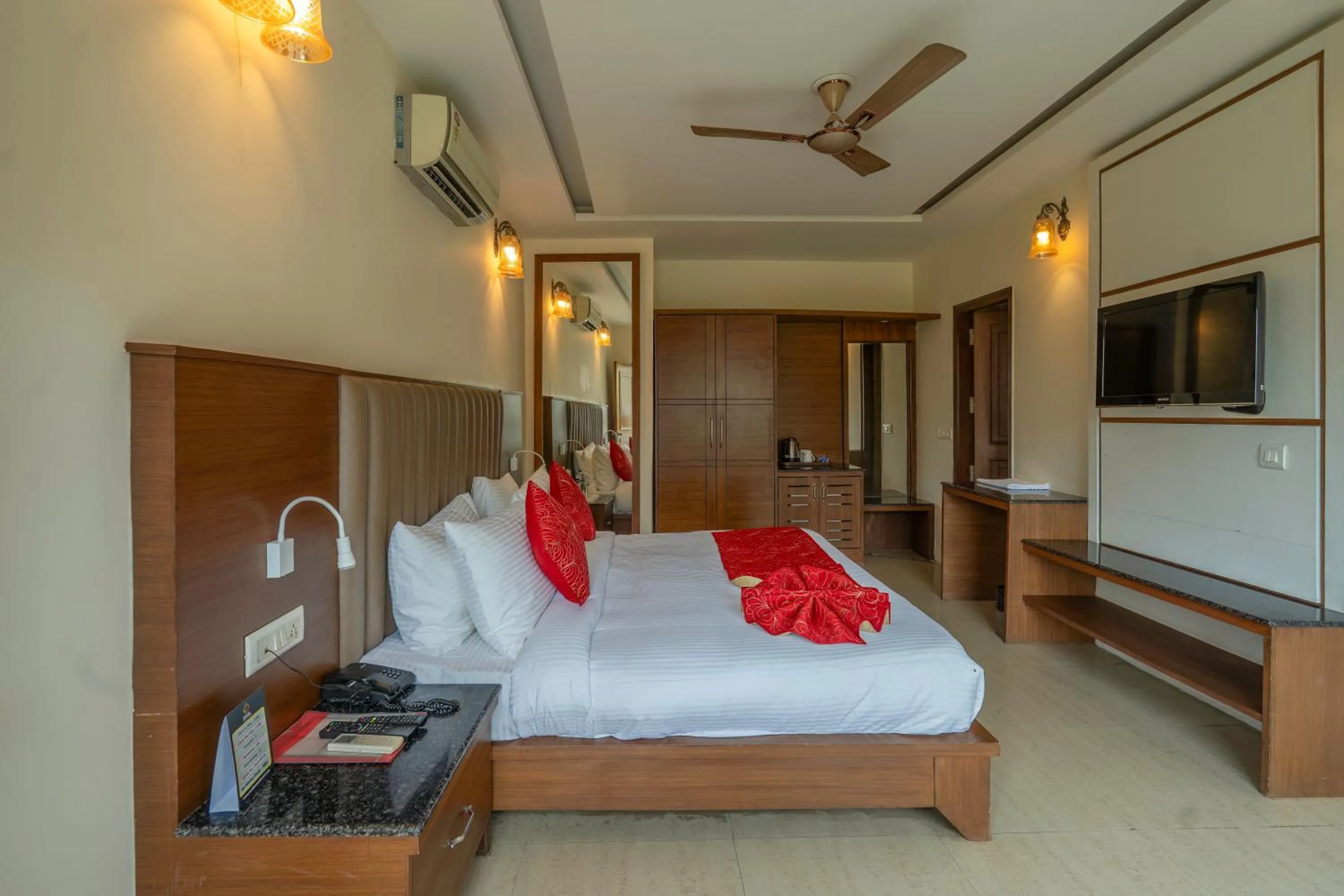 Bed in Excel Hotels and Resorts Bhimtal