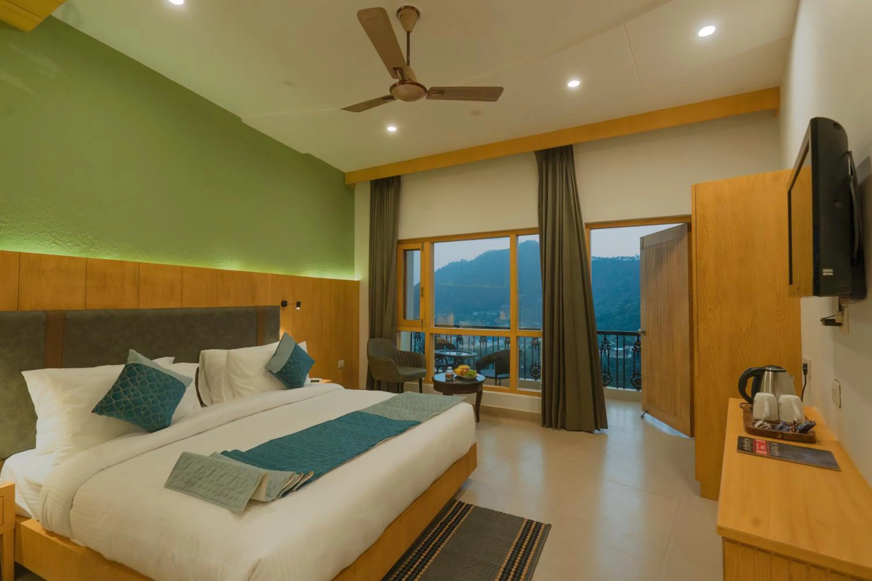 Bedroom, Bed in Excel Hotels and Resorts Bhimtal