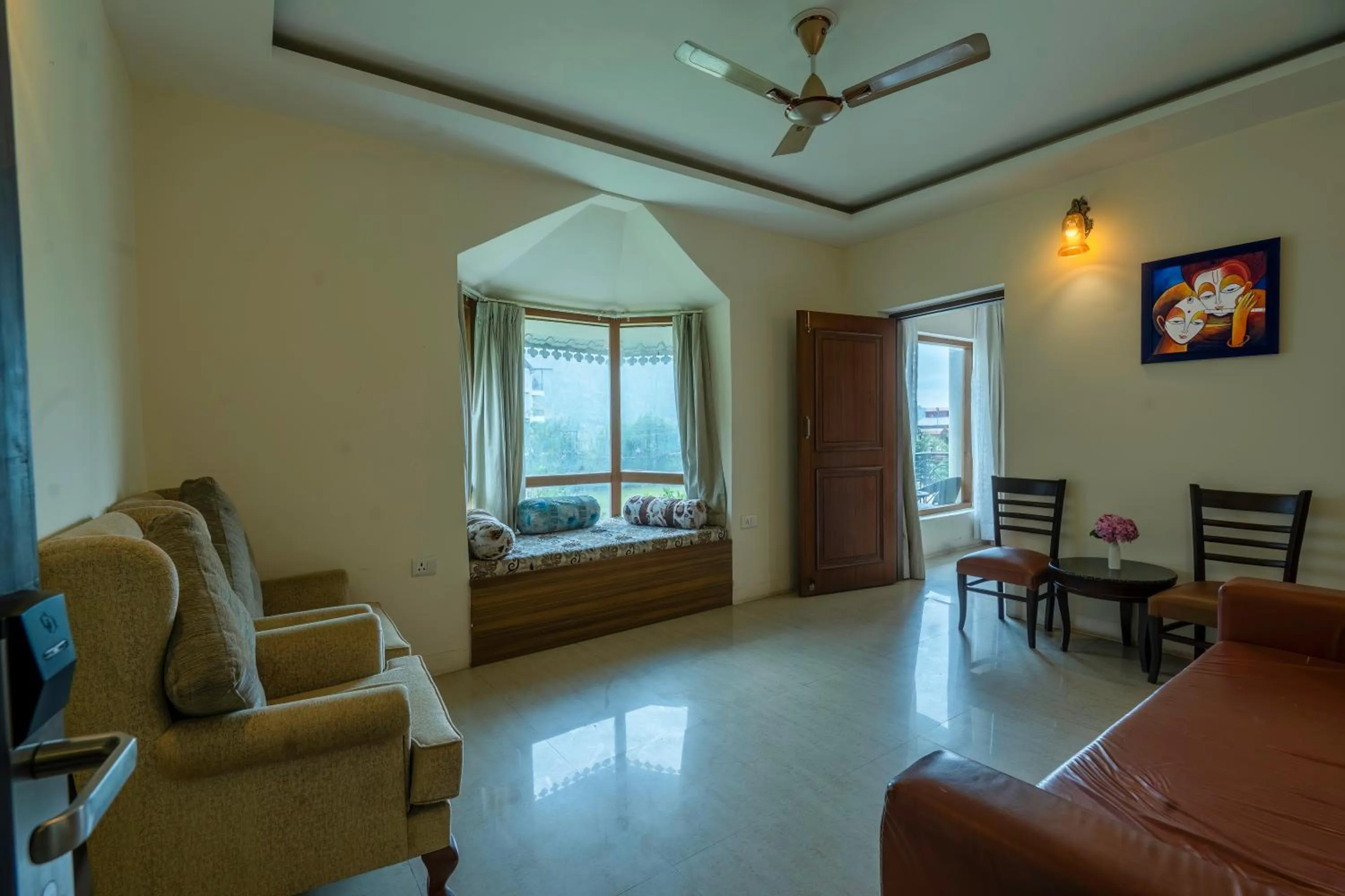 Seating area in Excel Hotels and Resorts Bhimtal