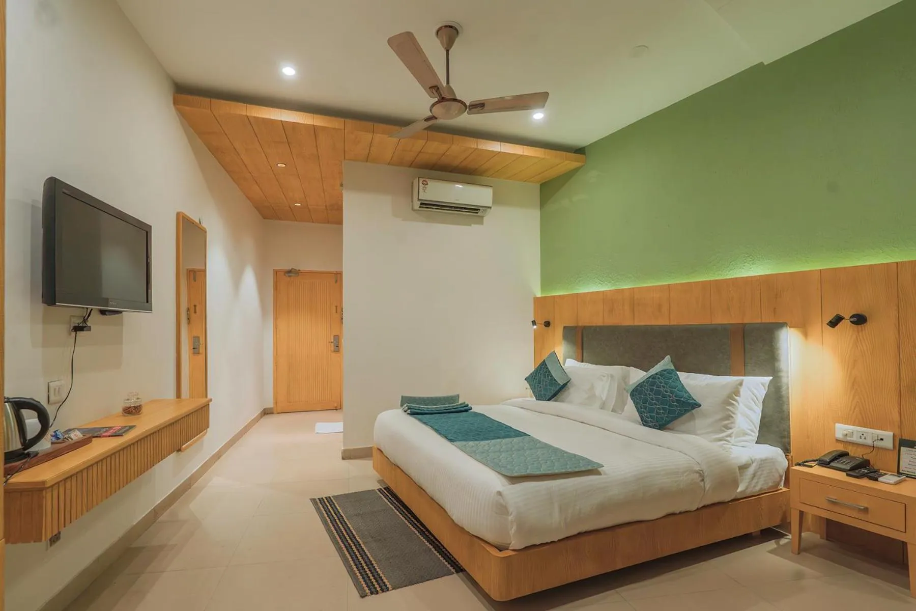 Bed in Excel Hotels and Resorts Bhimtal