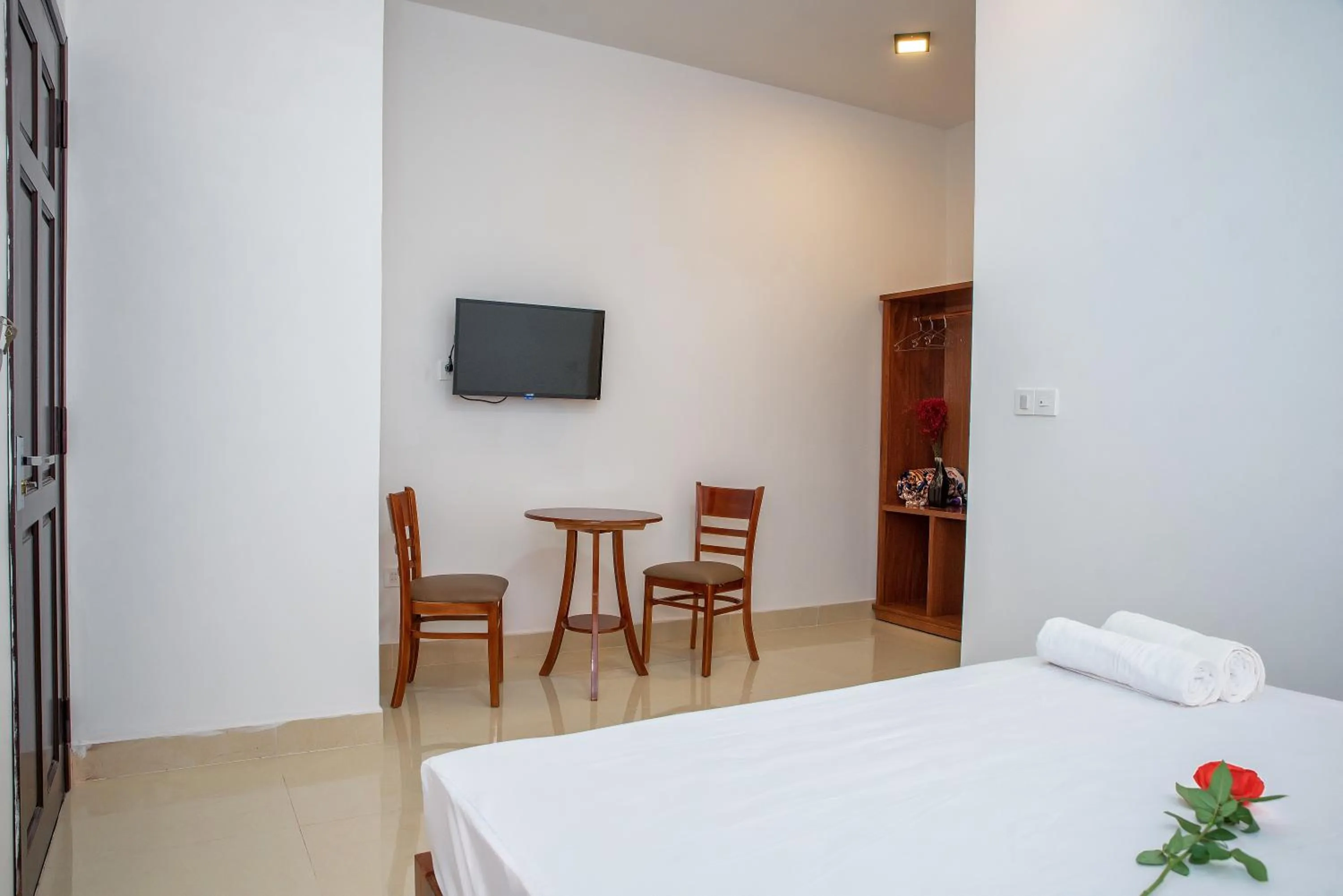 Communal lounge/ TV room, Bed in PaPa Villa Homestay