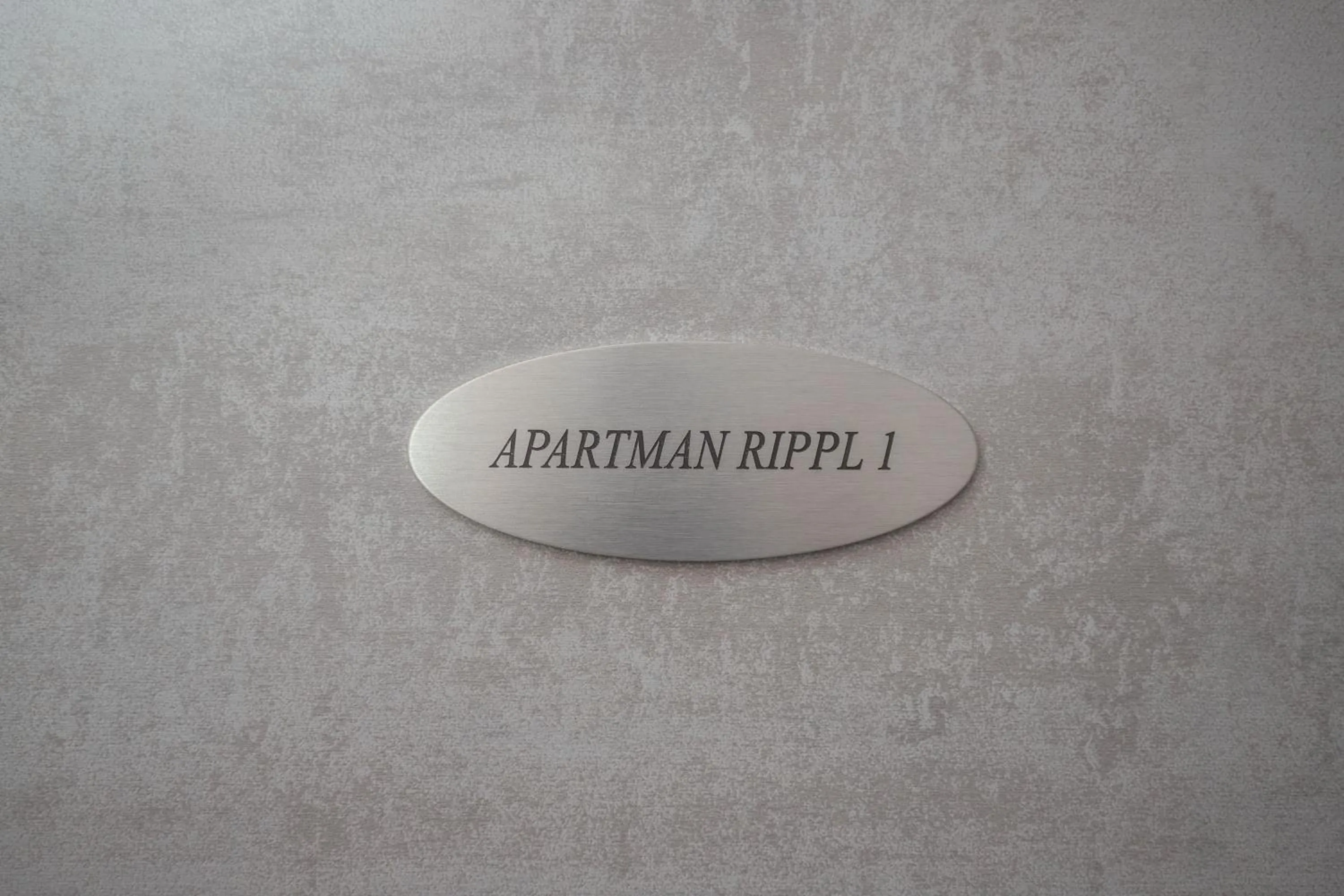 Property logo or sign in Apartment Rippl II